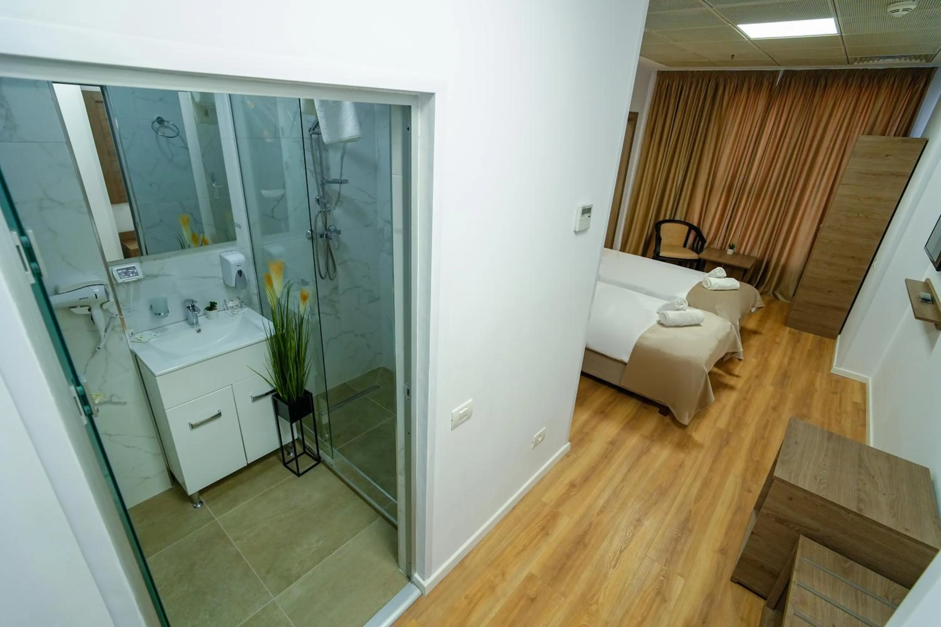 Bed in Sir Fundeni Hotel