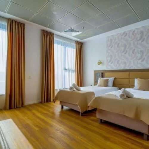 Bed in Sir Fundeni Hotel