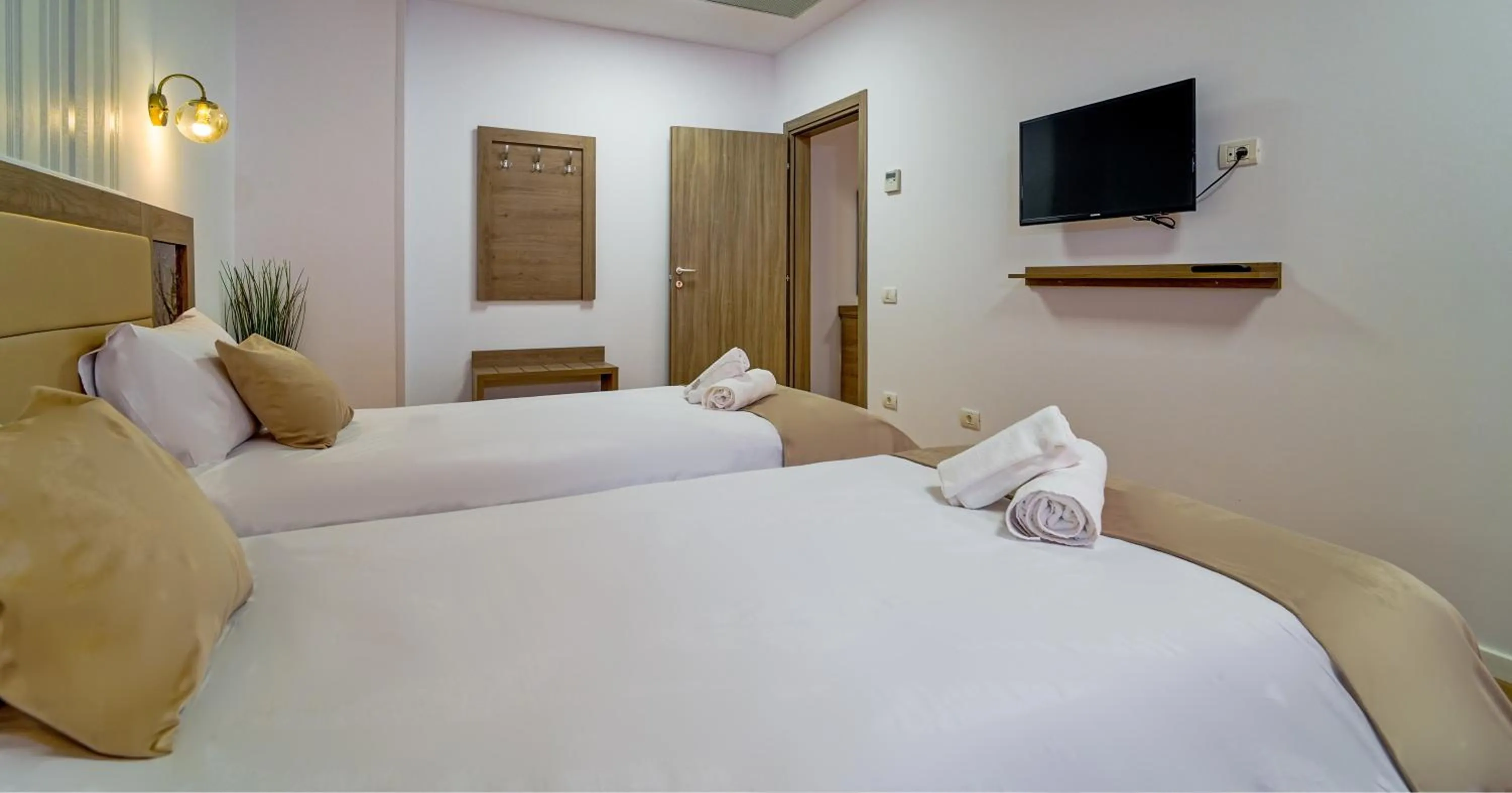 Bed in Sir Fundeni Hotel