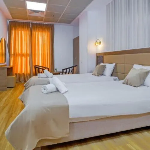 Bed in Sir Fundeni Hotel