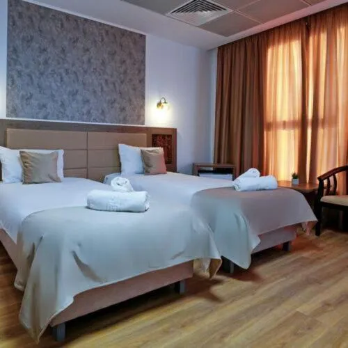 Bed in Sir Fundeni Hotel