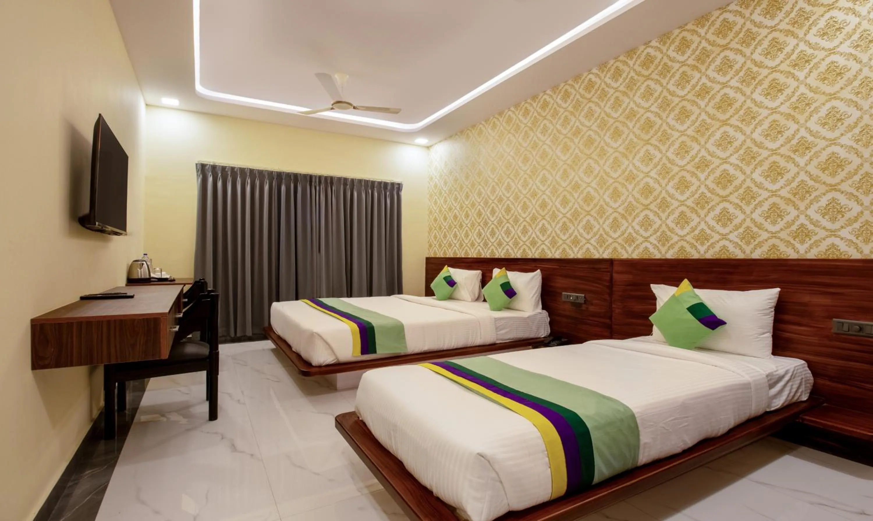 Bedroom, Bed in Treebo Jaguar Comforts, 3 Kms From Mahatma Gandhi Park