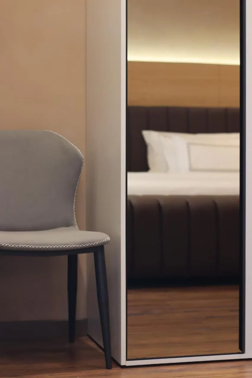 Seating area, Bed in Garden Boutique Hotel