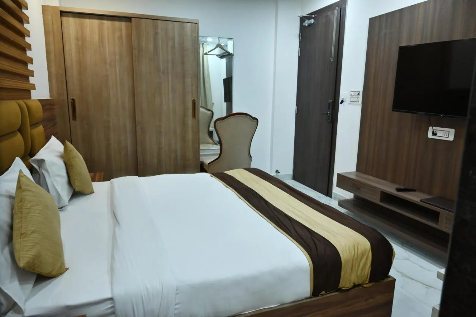 Bed in Hotel Navraj Palace