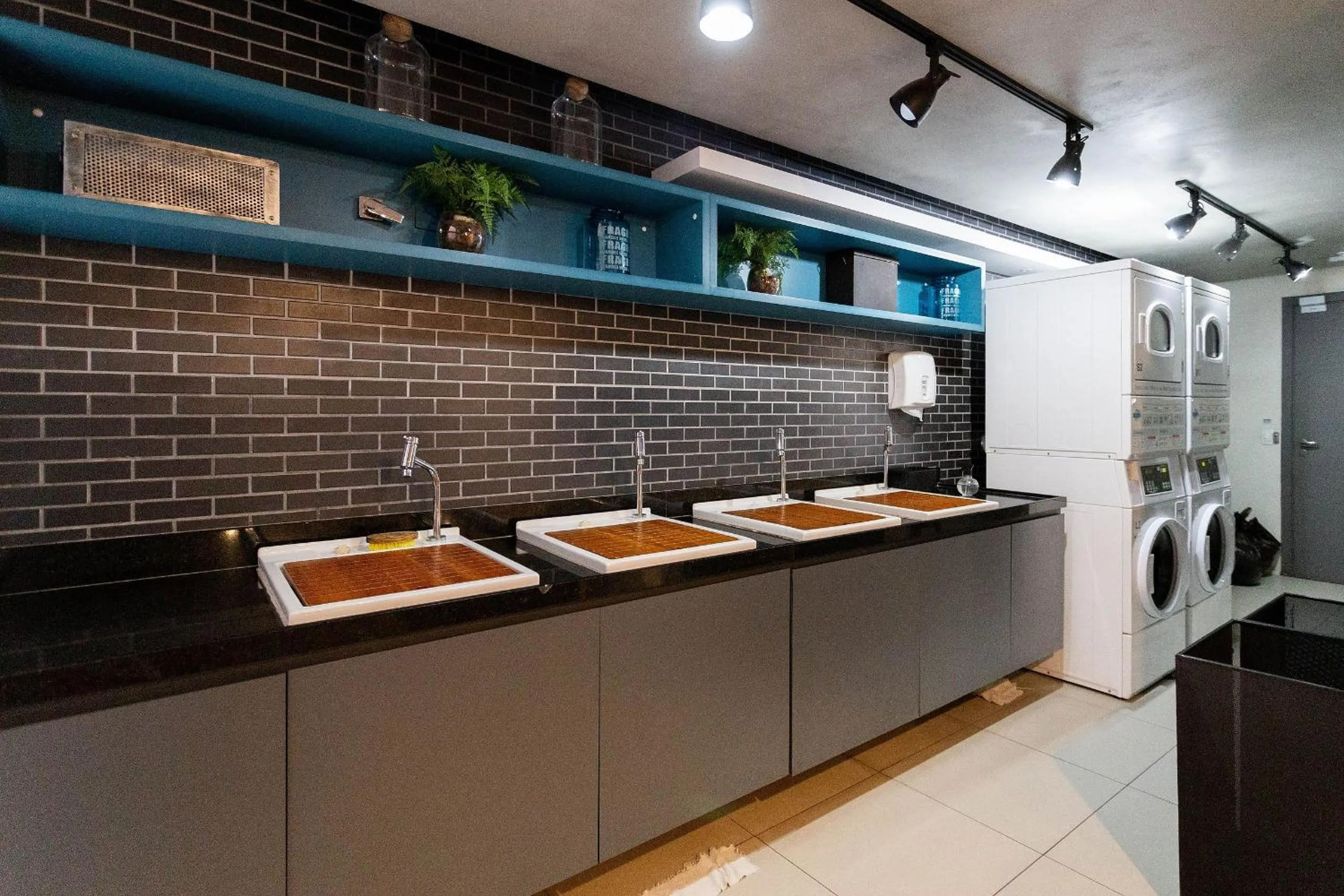 laundry in Condomínio Setin Downtown Genebra - Studios por temporada