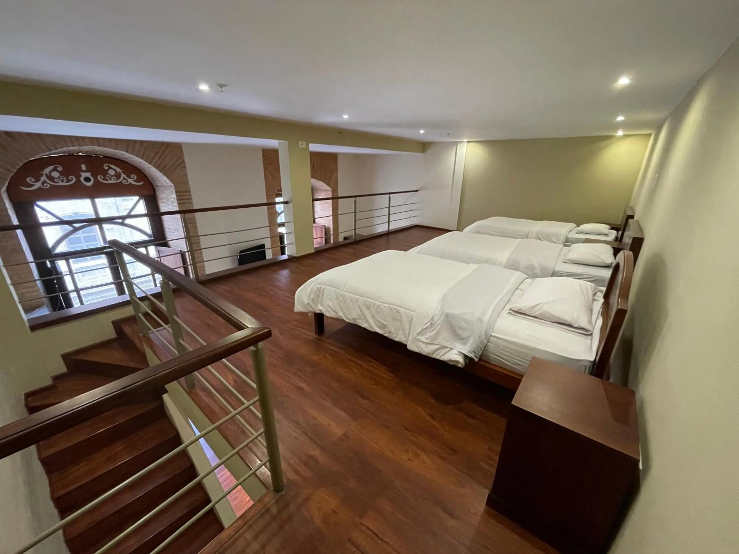 Photo of the whole room, Bed in Floré Hotel Boutique Cuenca