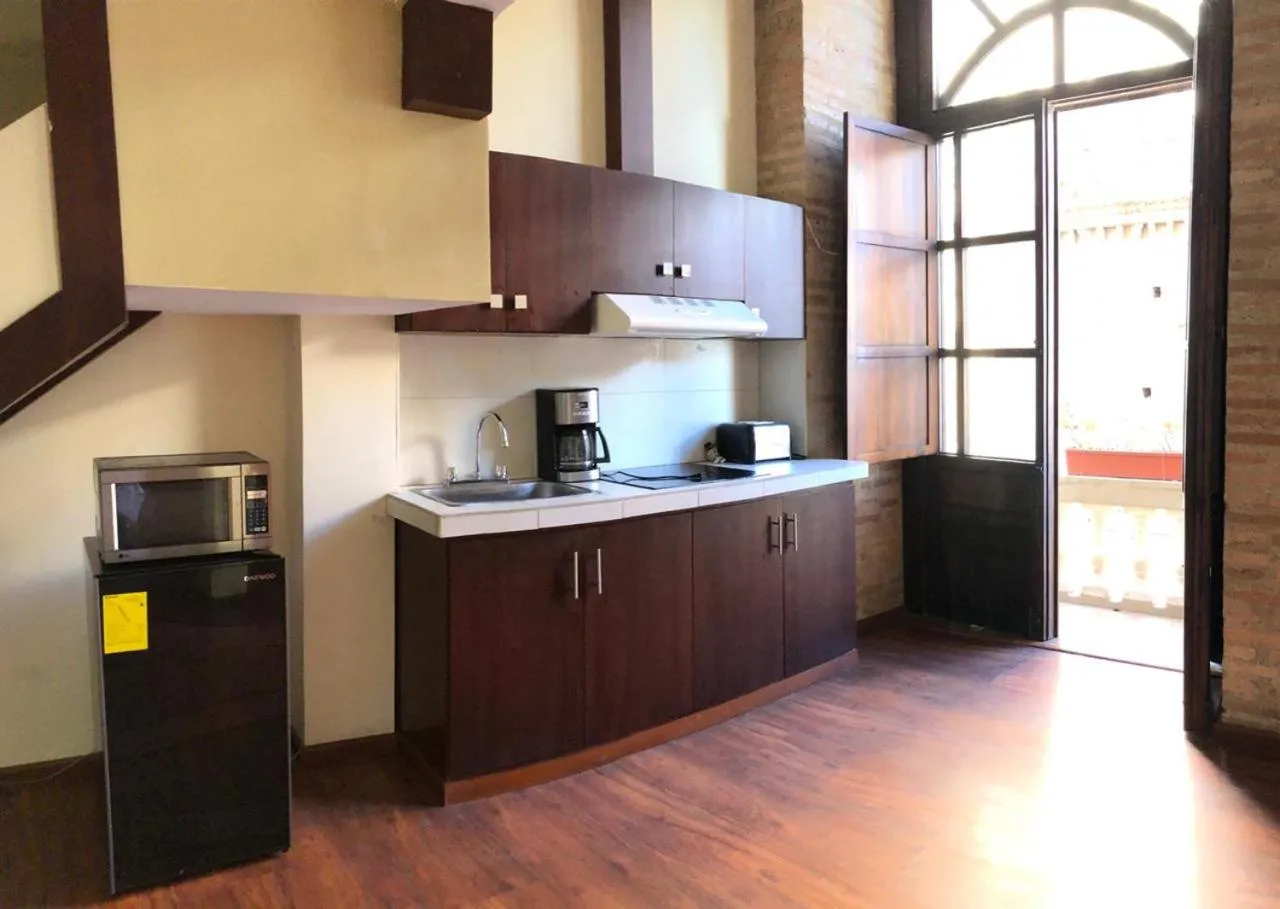 Kitchen or kitchenette in Floré Hotel Boutique Cuenca