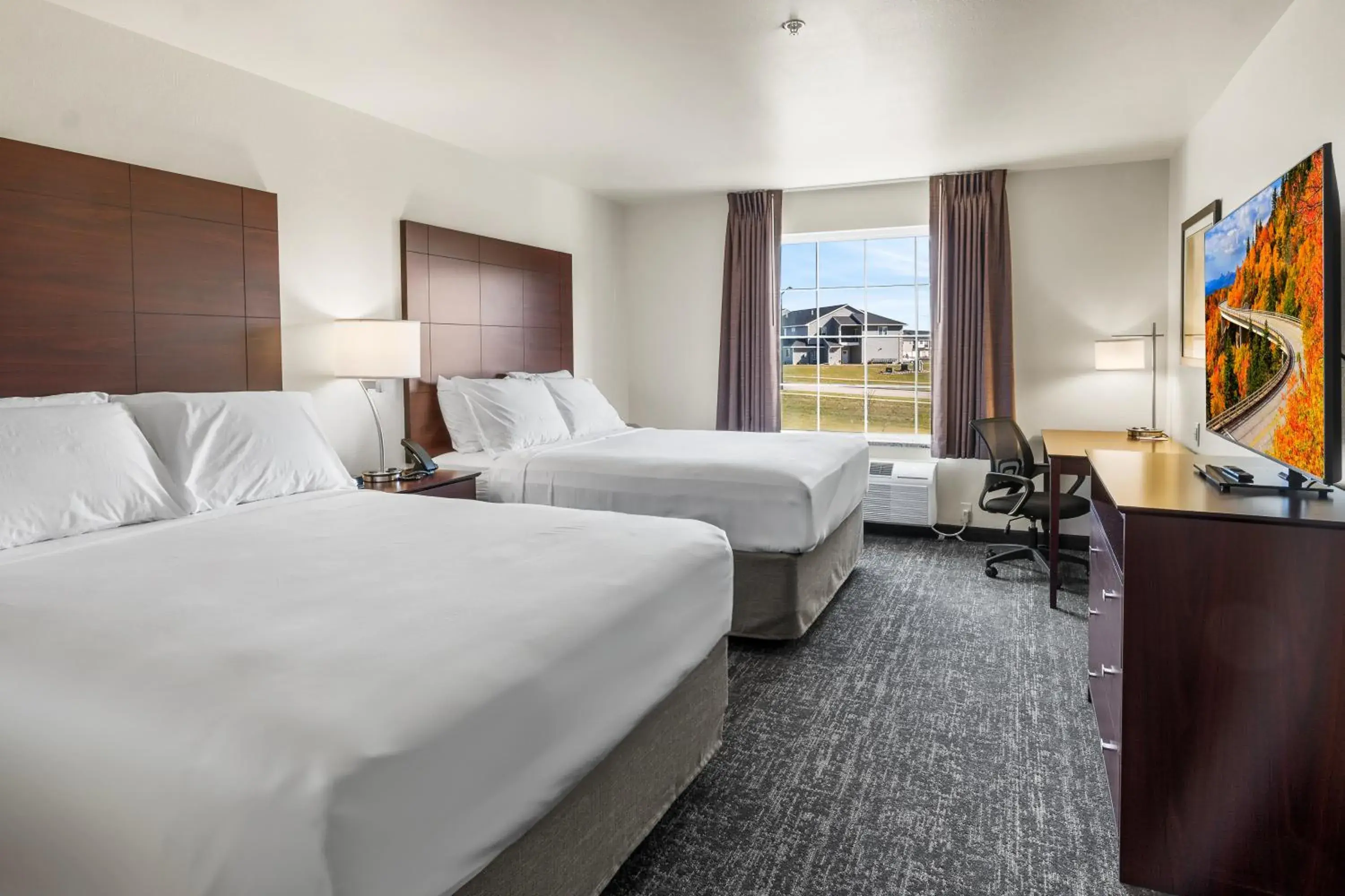 Queen Room in Cobblestone Hotel & Suites Denmark - Green Bay Queen Room in Cobblestone Hotel & Suites Denmark - Green Bay