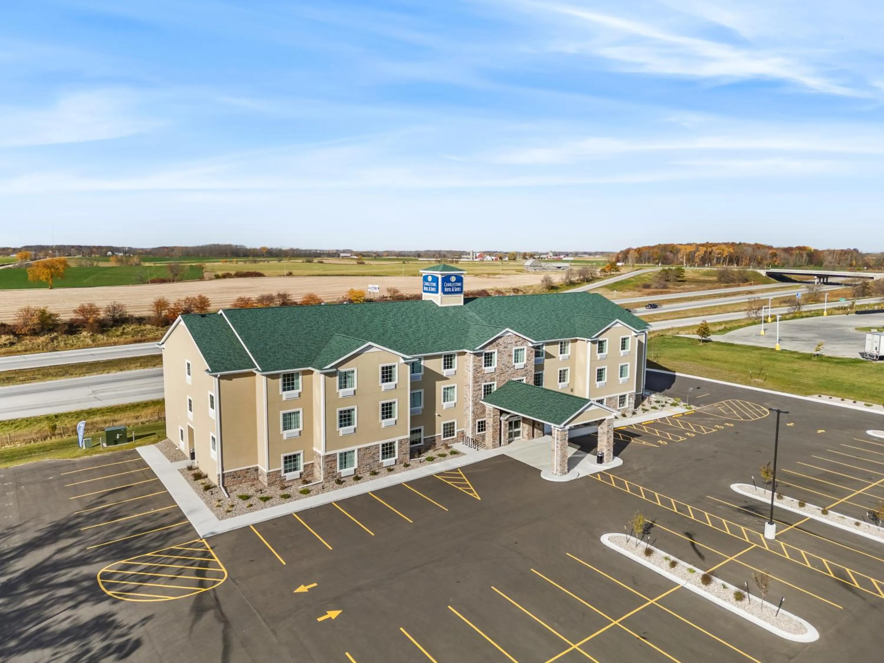 Property building in Cobblestone Hotel & Suites Denmark - Green Bay