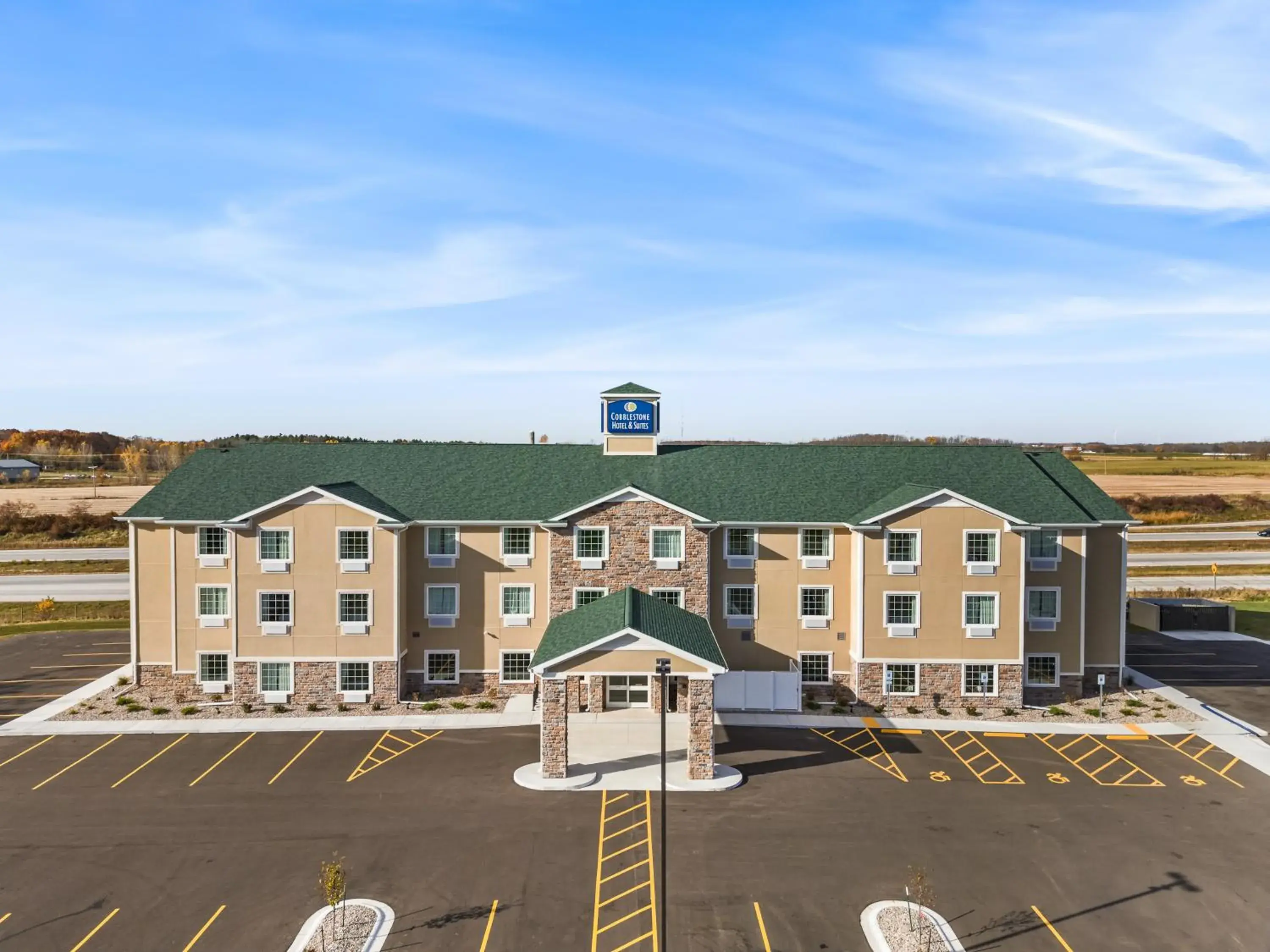 Property building in Cobblestone Hotel & Suites Denmark - Green Bay Property building in Cobblestone Hotel & Suites Denmark - Green Bay