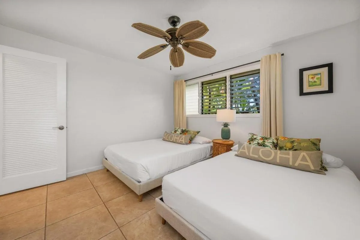 Bed in International Colony Club 37 · ICC 37 Remodeled Hawaiian Cottage