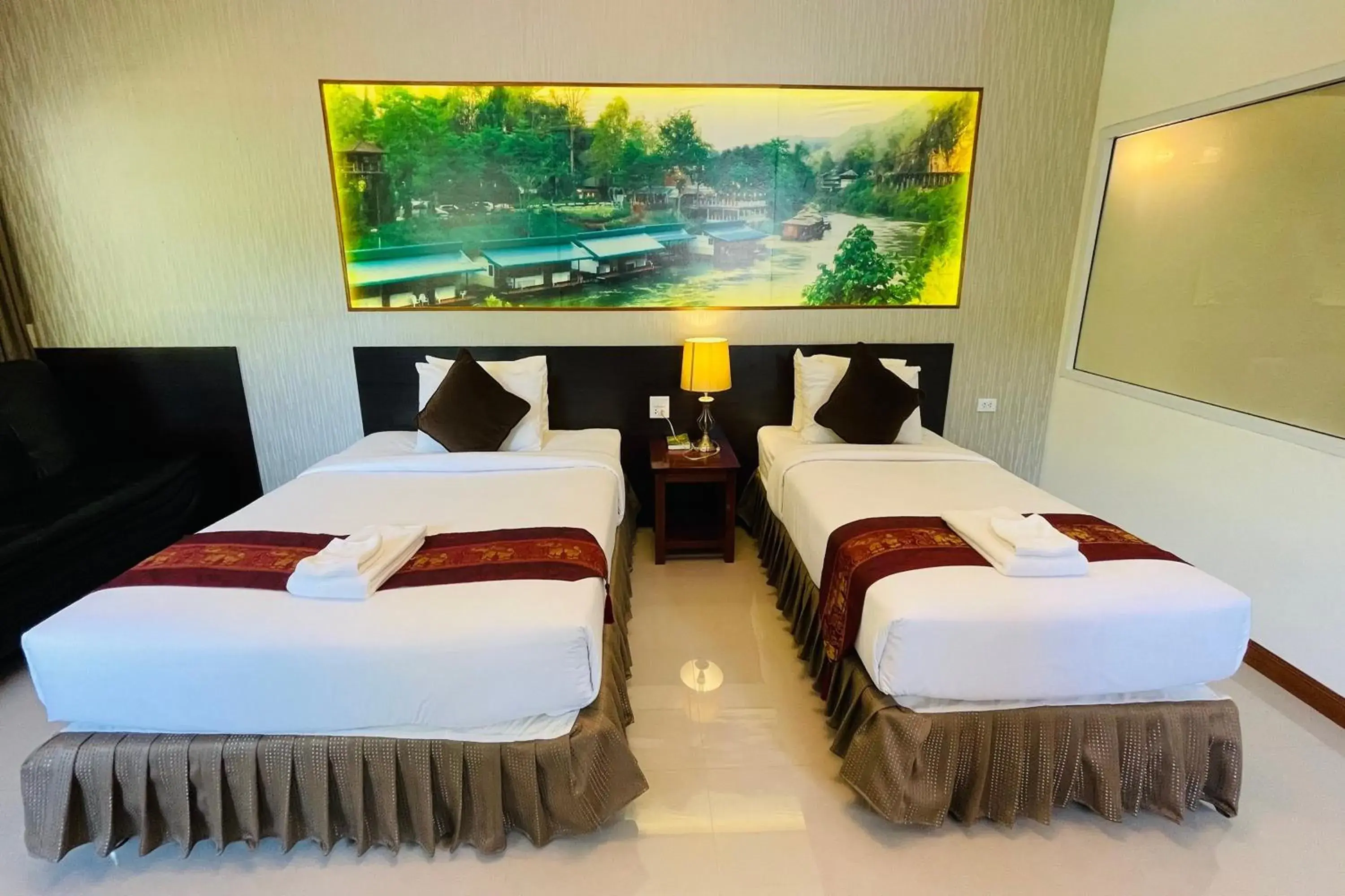 Bed in Baan Rim Kwai Paerimnam Resort Bed in Baan Rim Kwai Paerimnam Resort