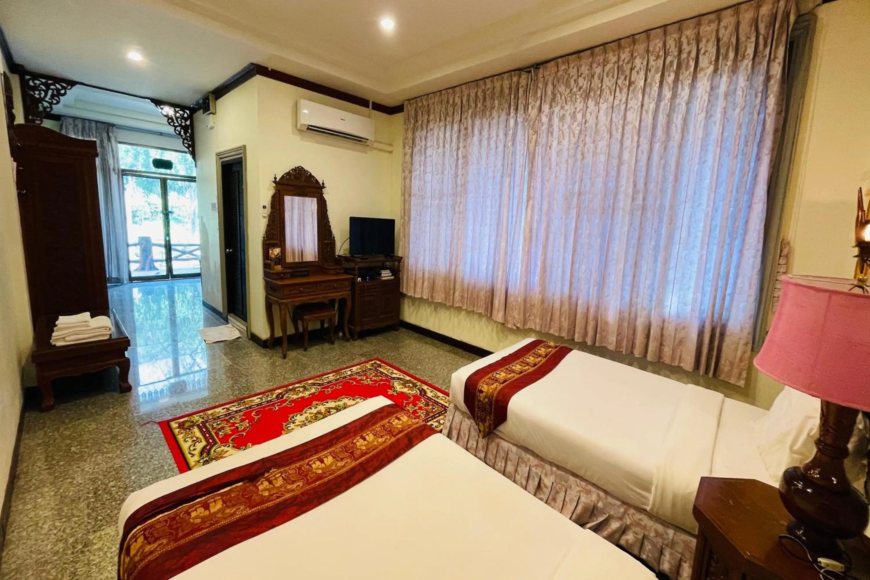 Bed in Baan Rim Kwai Paerimnam Resort