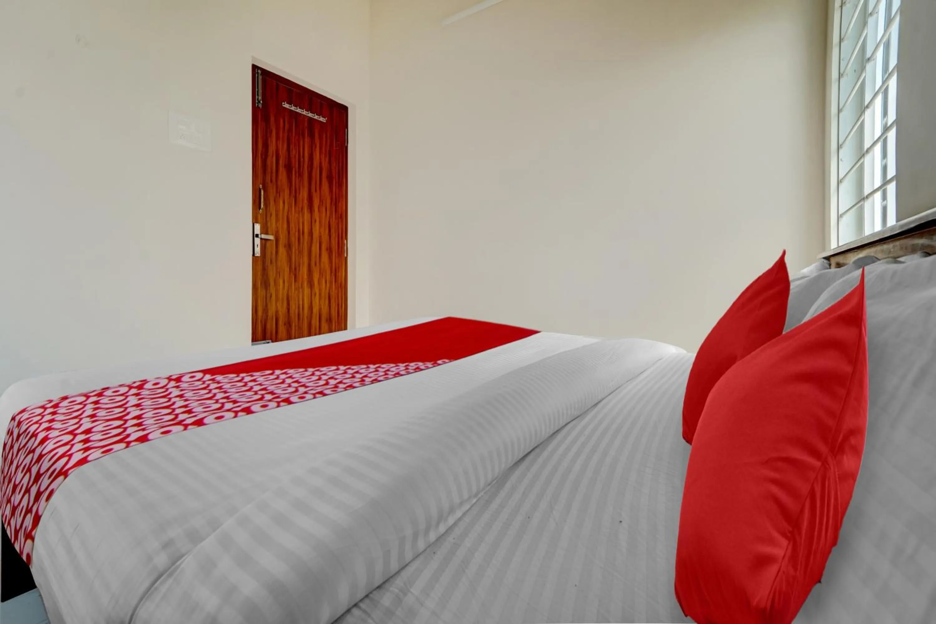 Bedroom in Hotel O MM Home Stays