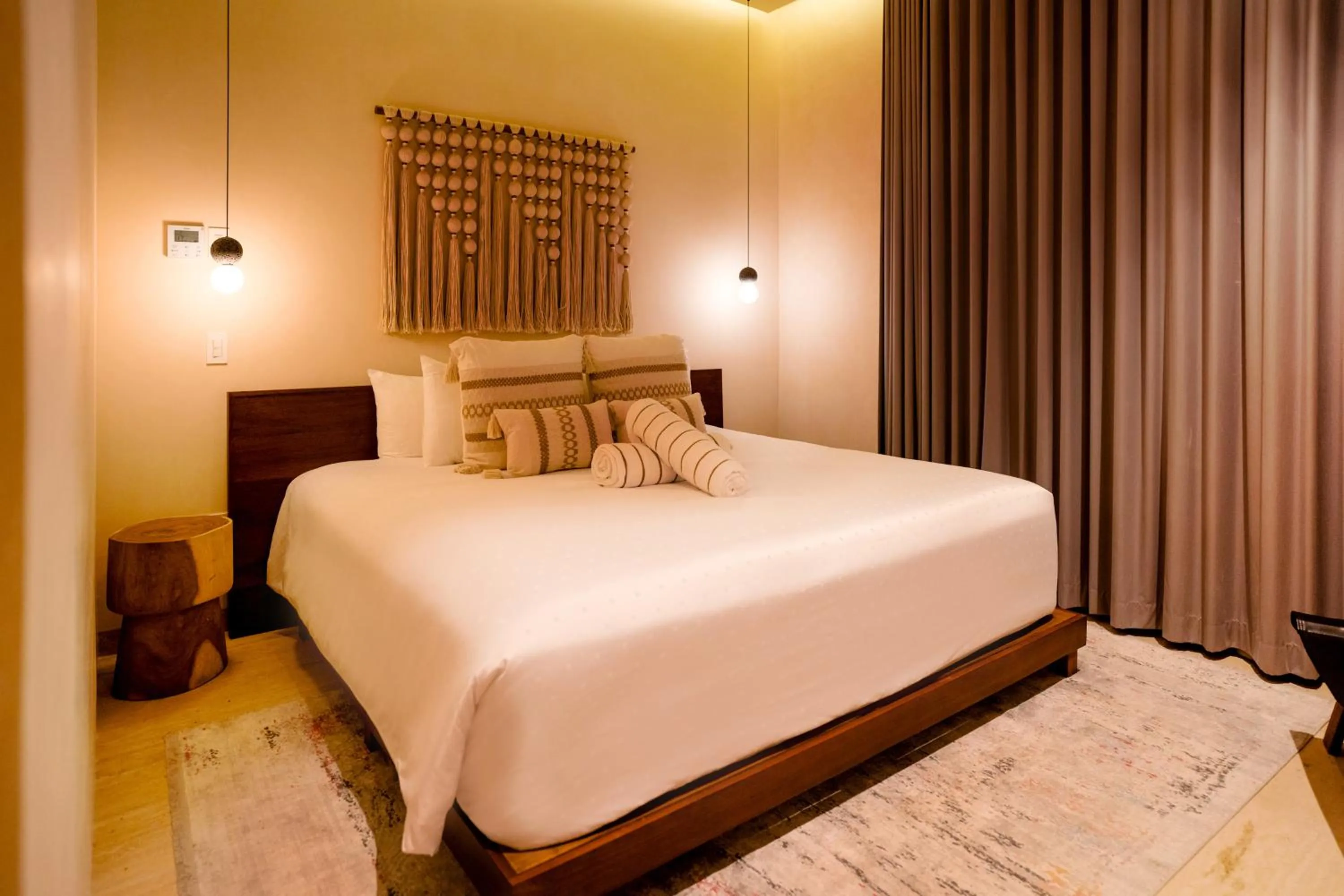 Bed in Bloom Tulum Apartments