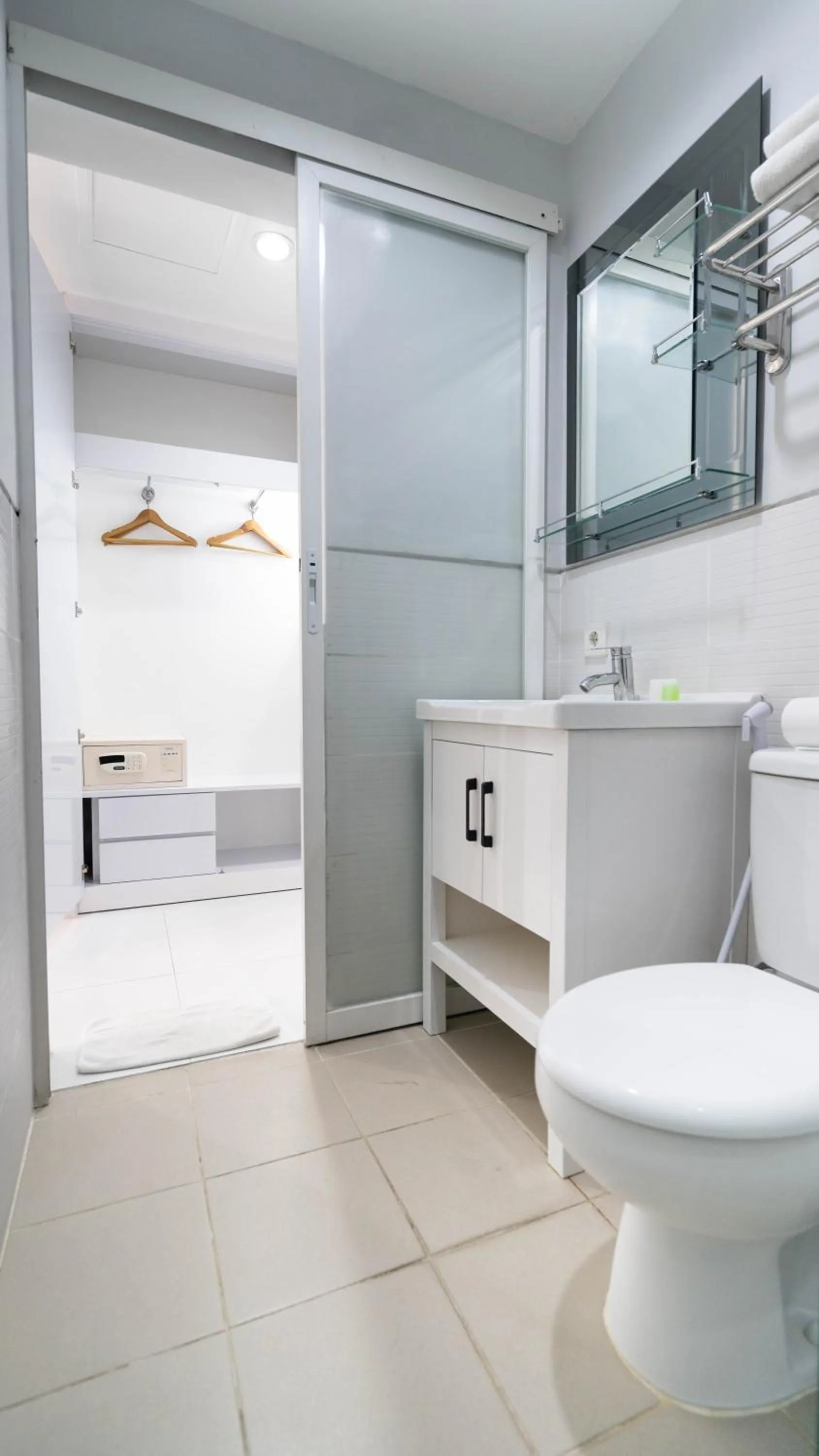 Shower in Cozy Stay Bali by ARM Hospitality