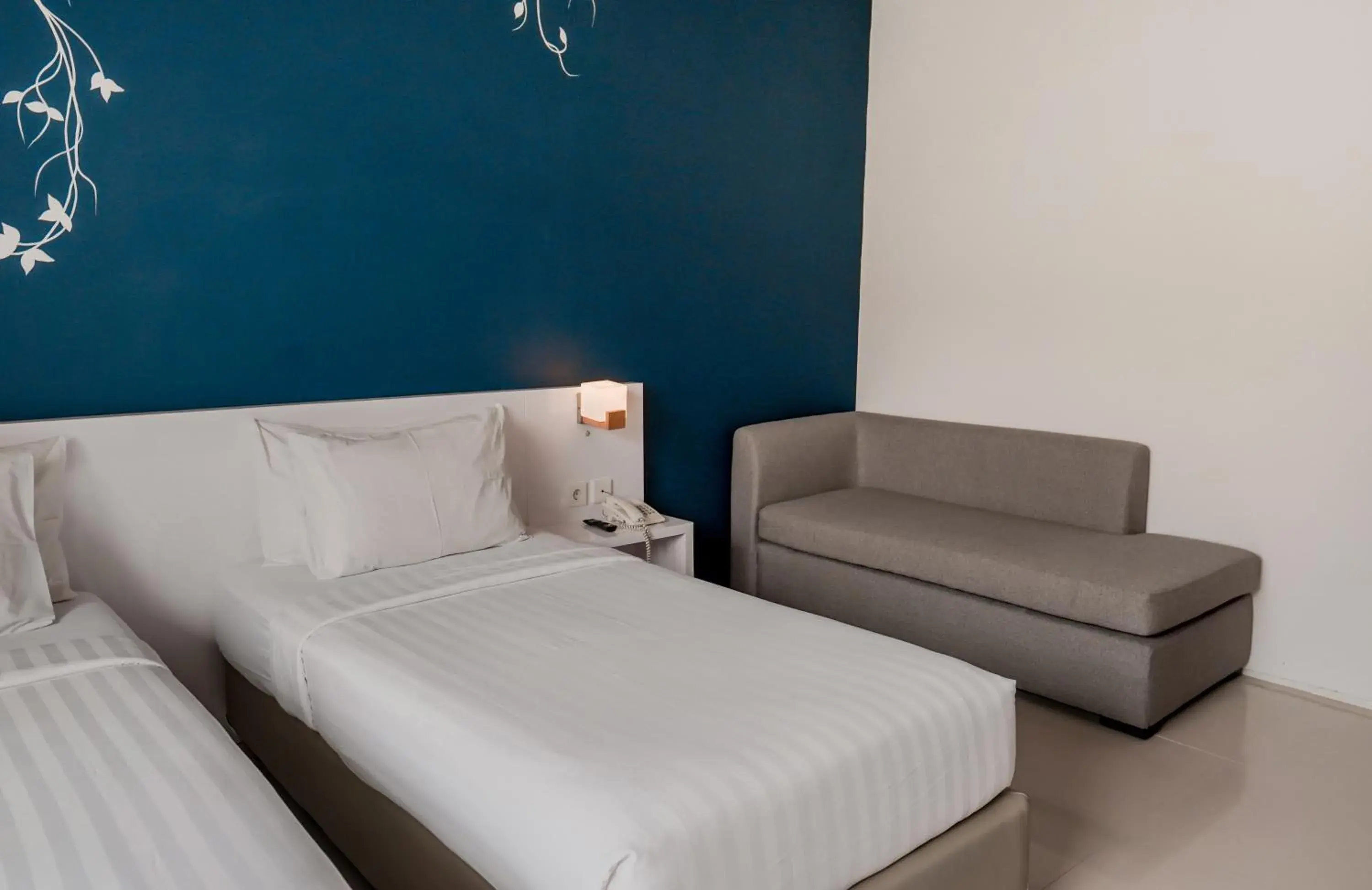 Bed in Cozy Stay Bali by ARM Hospitality Bed in Cozy Stay Bali by ARM Hospitality