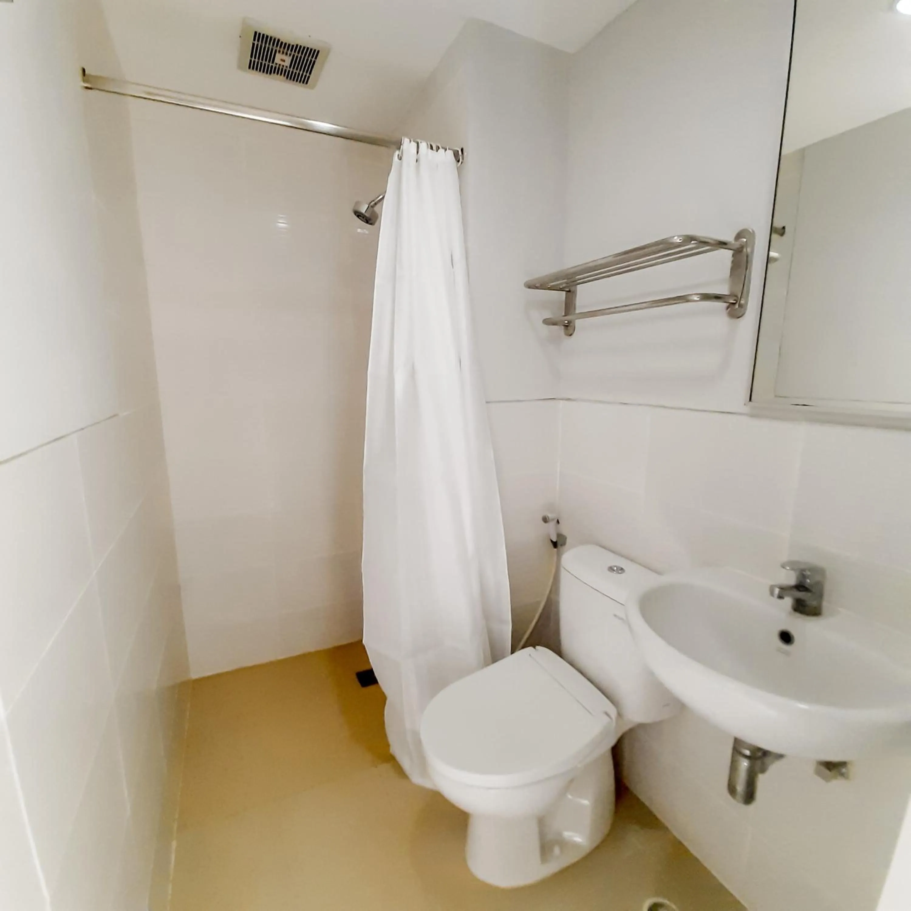 Shower in Cozy Stay Bali by ARM Hospitality