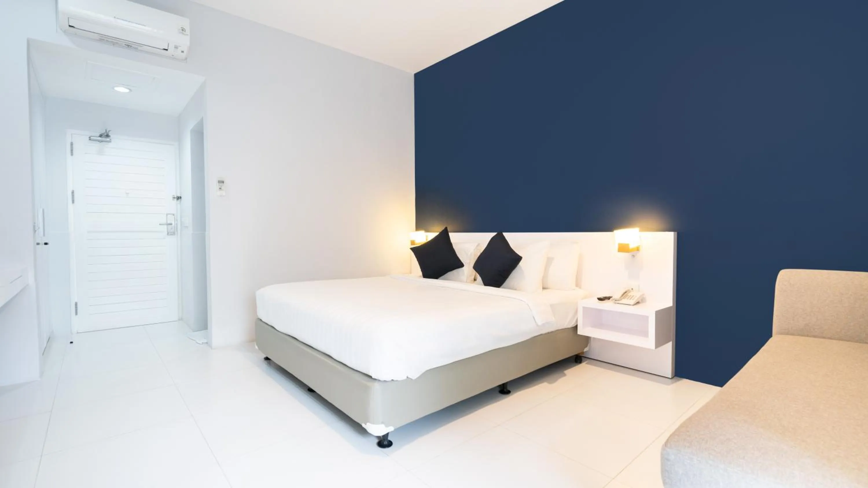 Bed in Cozy Stay Bali by ARM Hospitality