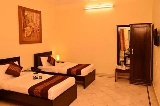 Bed in HOTEL KARAN VILLAS