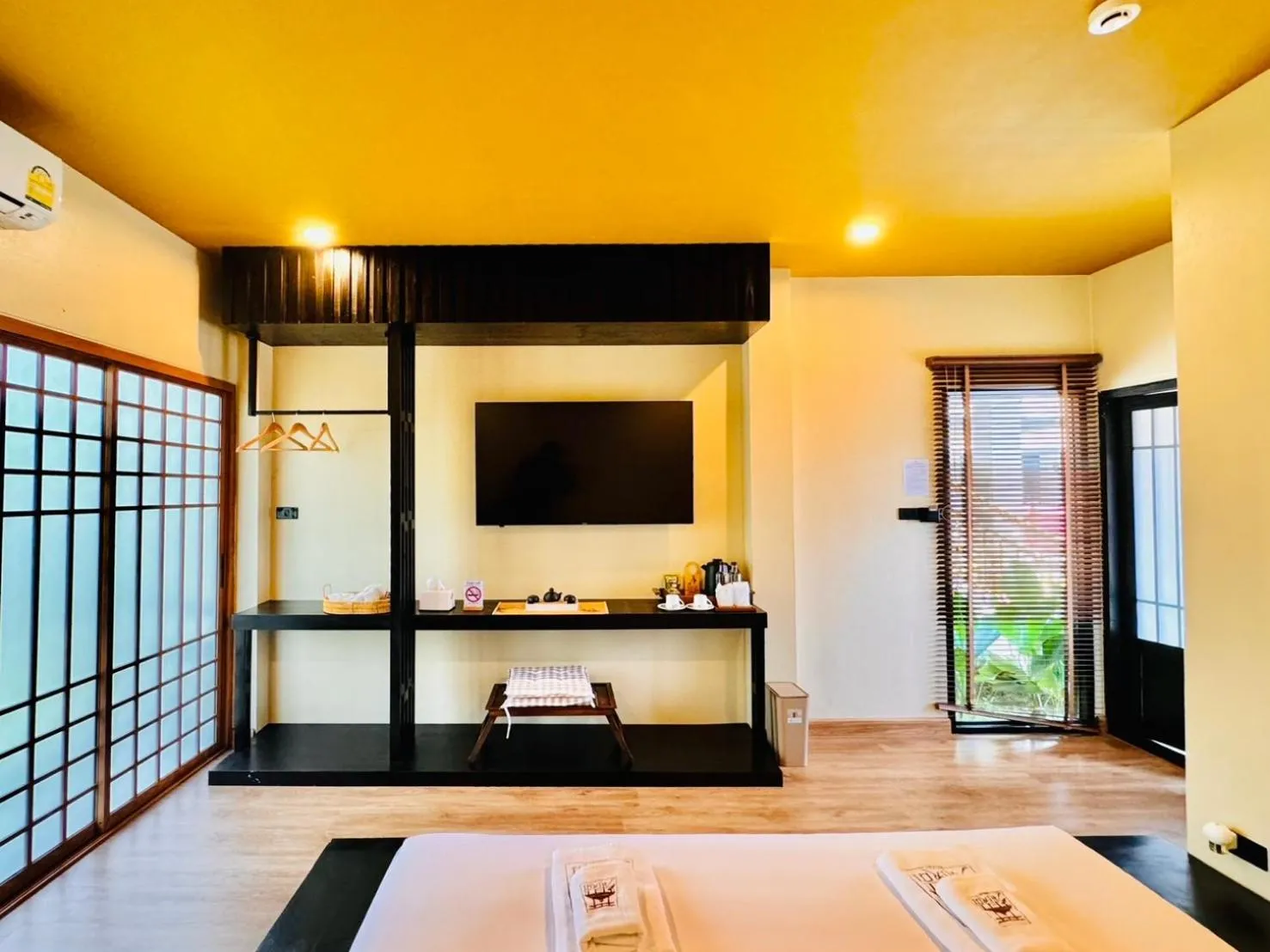 Bed in COZY SHIROI RESORT