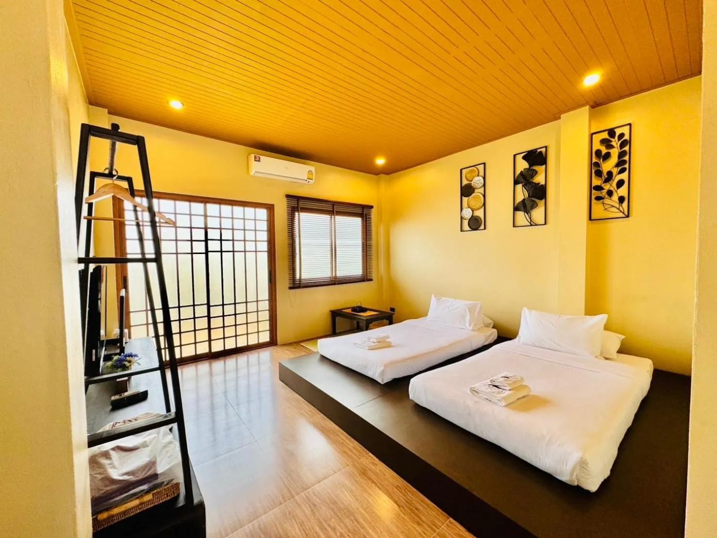 Photo of the whole room, Bed in COZY SHIROI RESORT