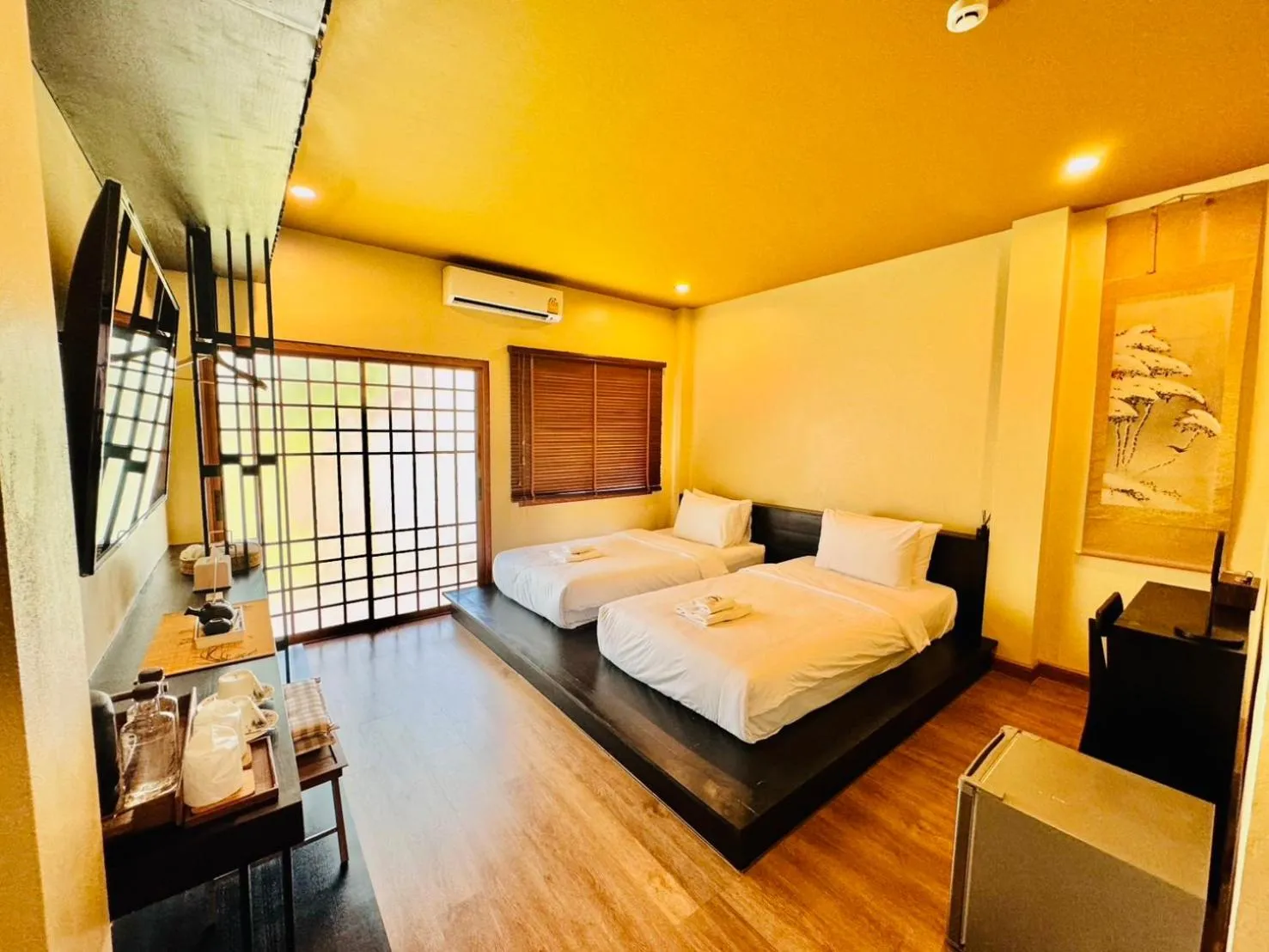 Bed in COZY SHIROI RESORT