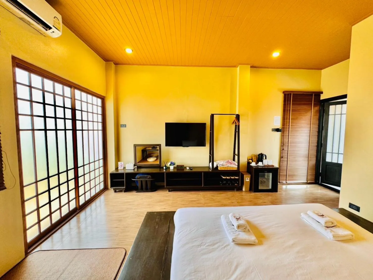 Photo of the whole room, Bed in COZY SHIROI RESORT