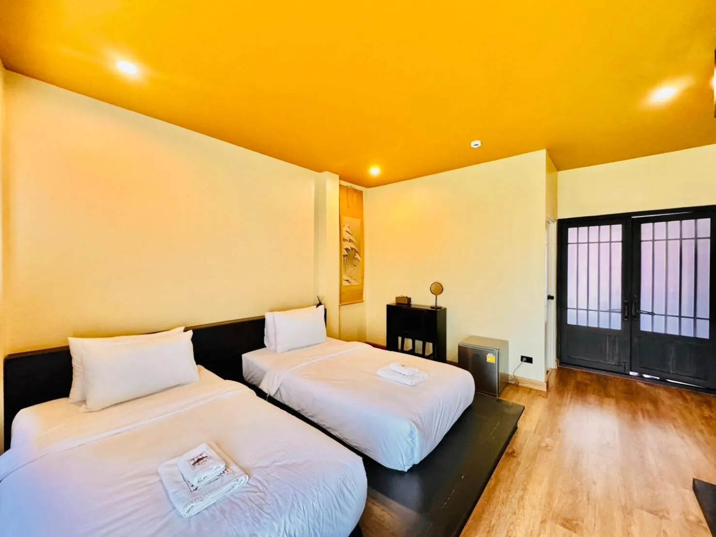 Bed in COZY SHIROI RESORT