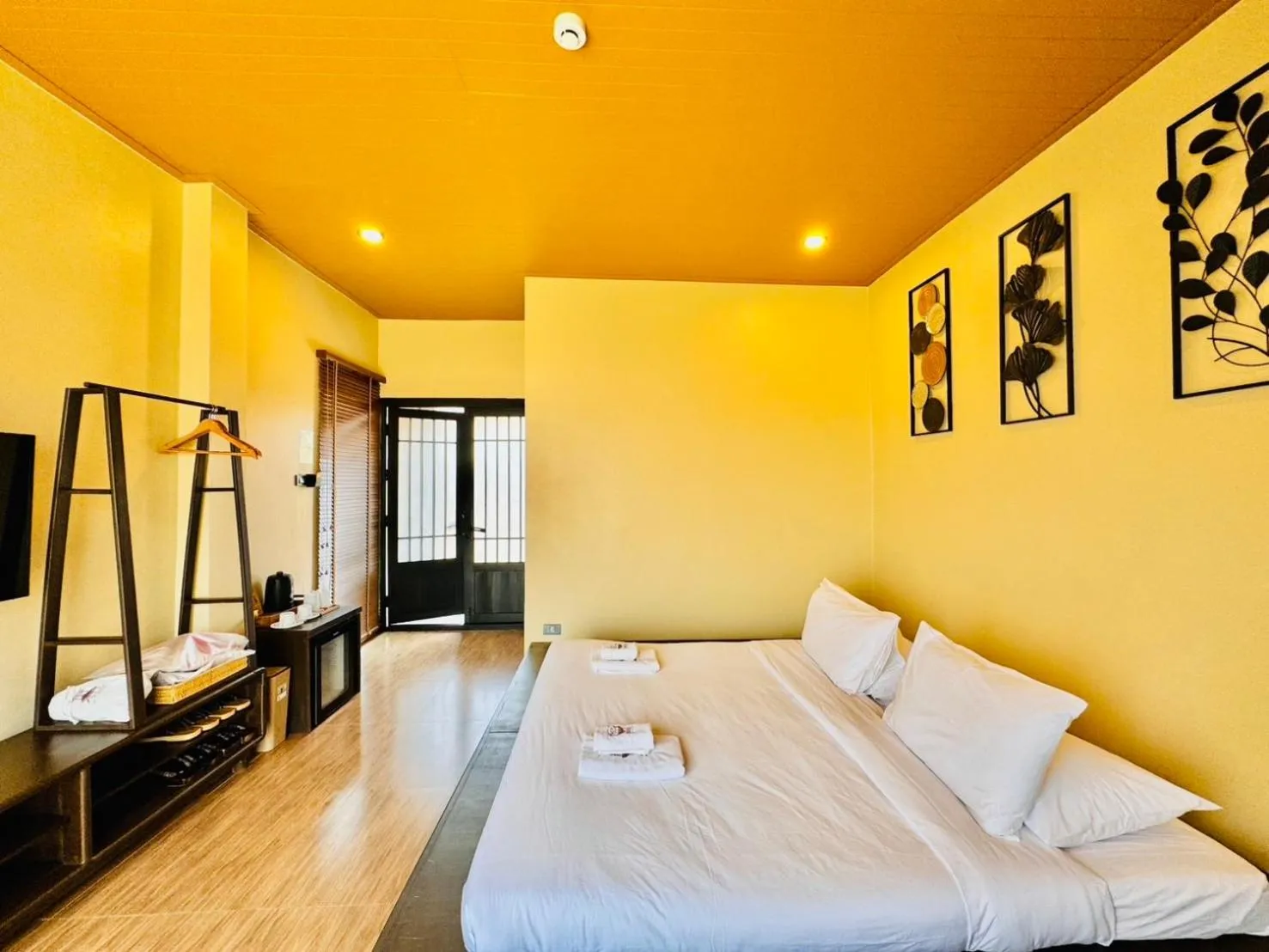 Photo of the whole room, Bed in COZY SHIROI RESORT