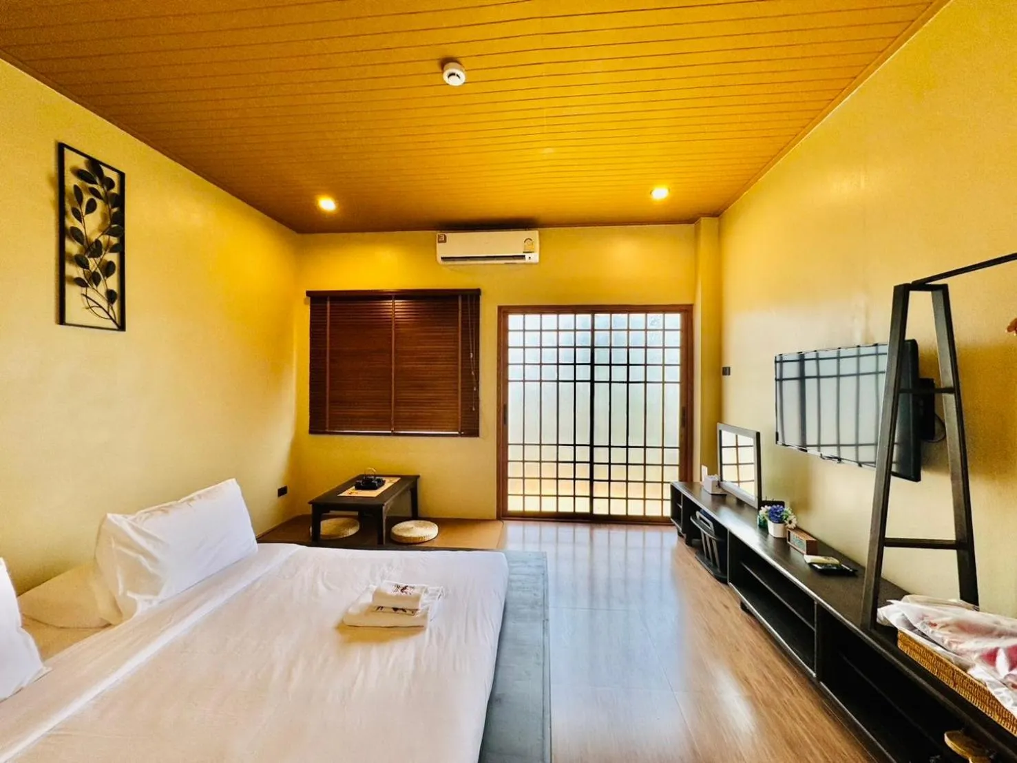 Photo of the whole room, Bed in COZY SHIROI RESORT
