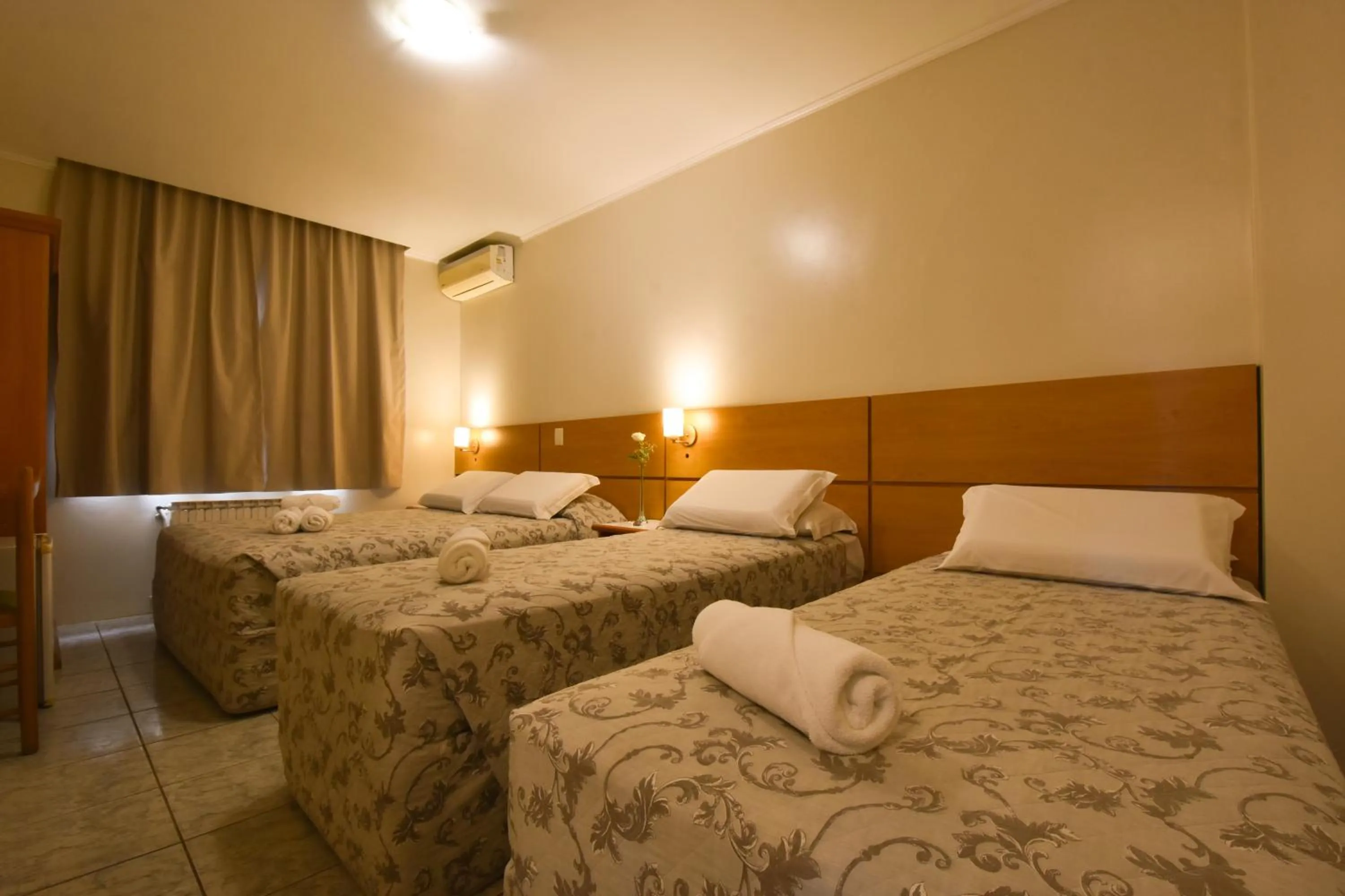 Bed in Pousada Stillo Gramado Via Serena