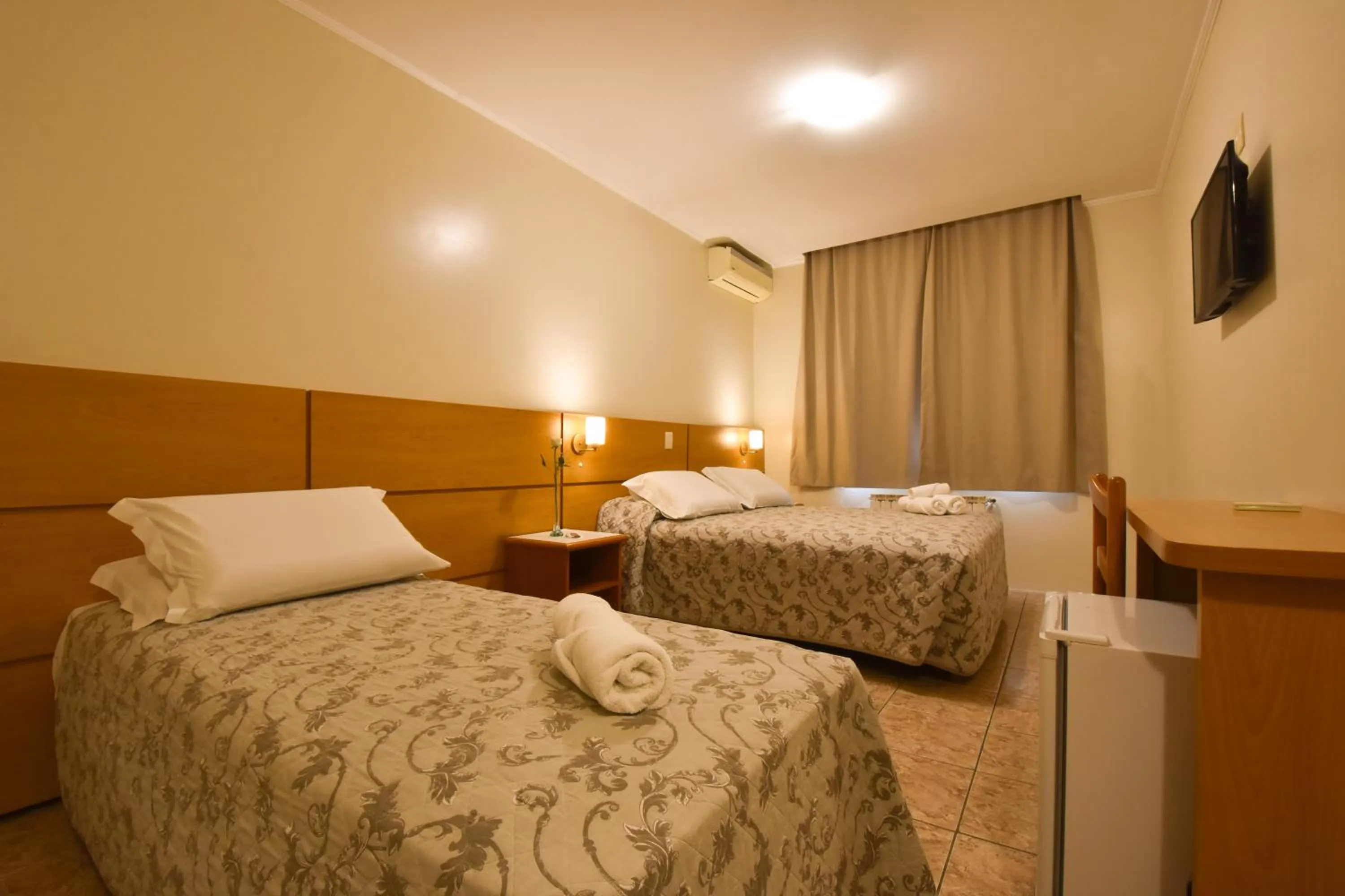 Bed in Pousada Stillo Gramado Via Serena