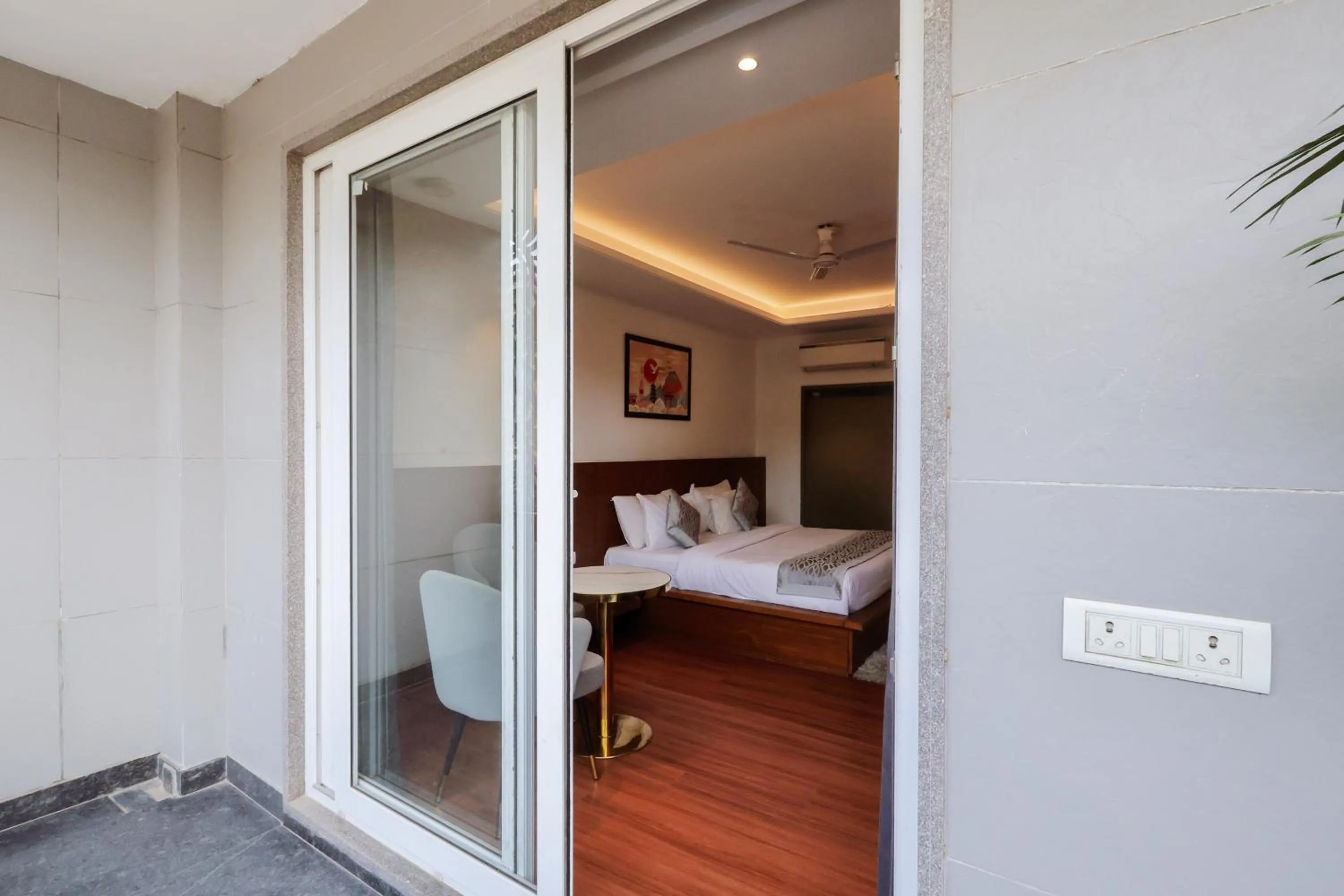 Balcony/Terrace, Bed in Nikko Premier - Near Medanta Hospital