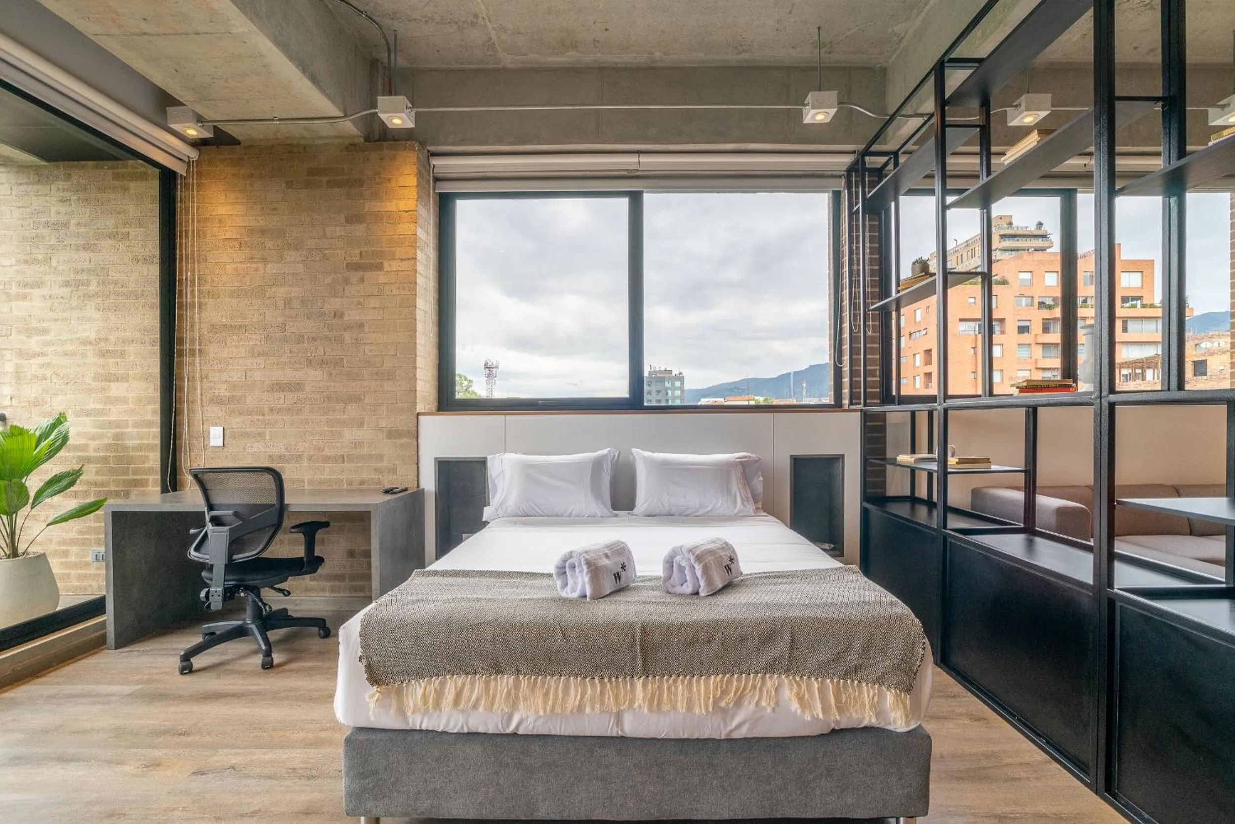 Photo of the whole room, Bed in Canvas By Wynwood House