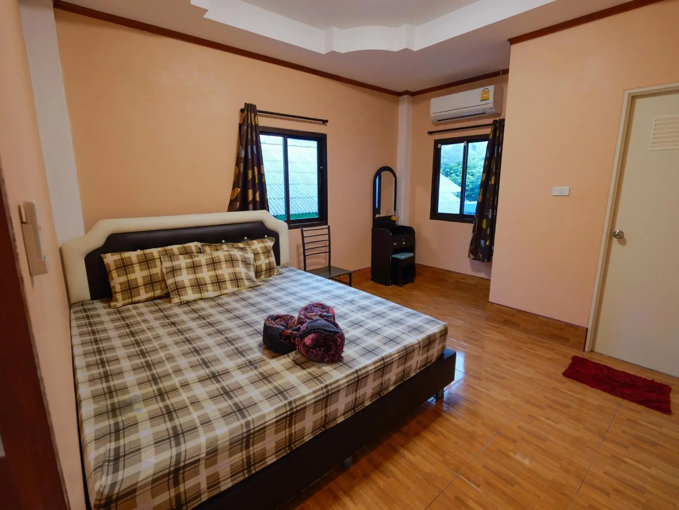 Bed in Boonsong Guest House Bed in Boonsong Guest House