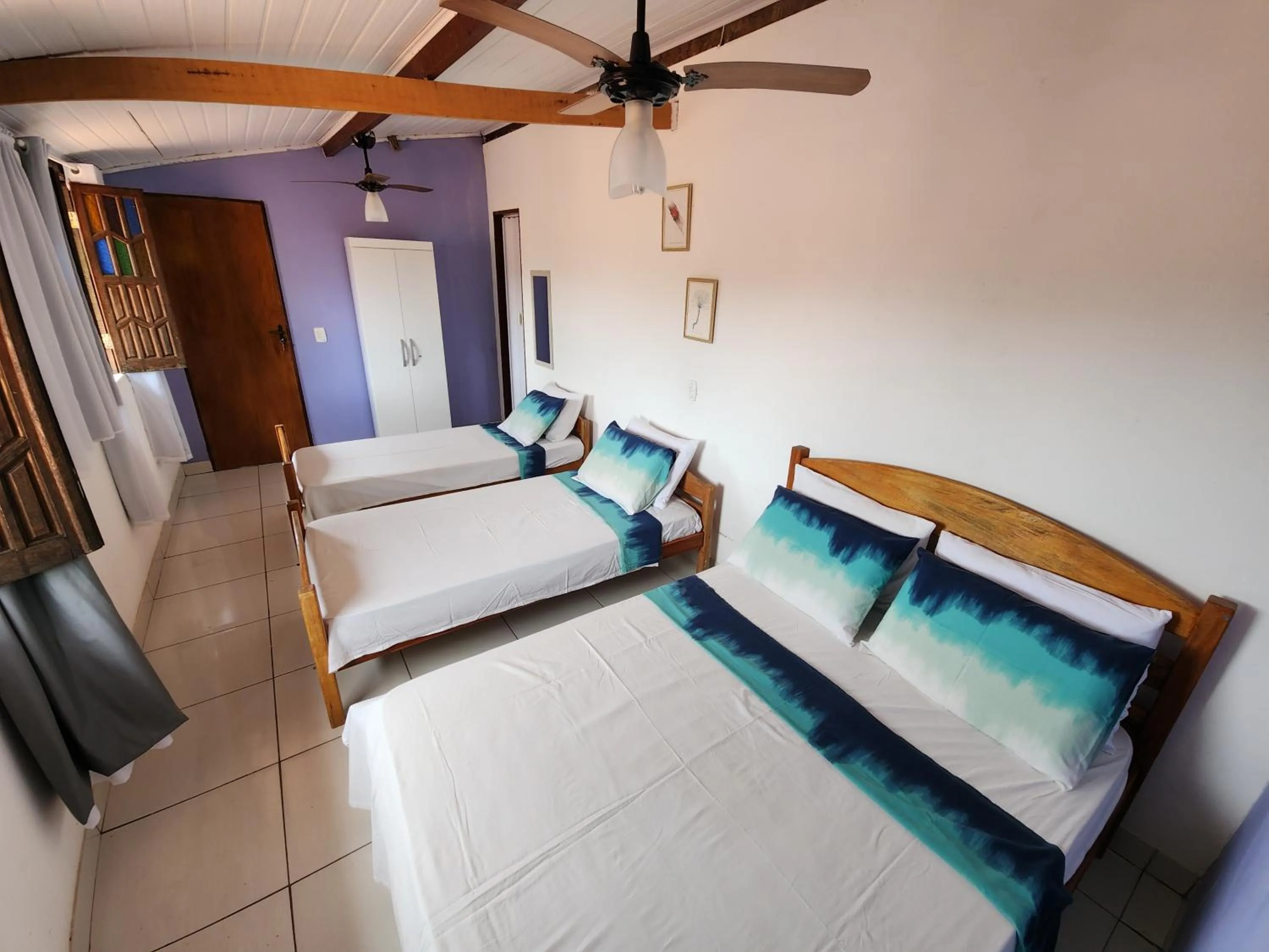 Bed in Pousada Velho Garimpo
