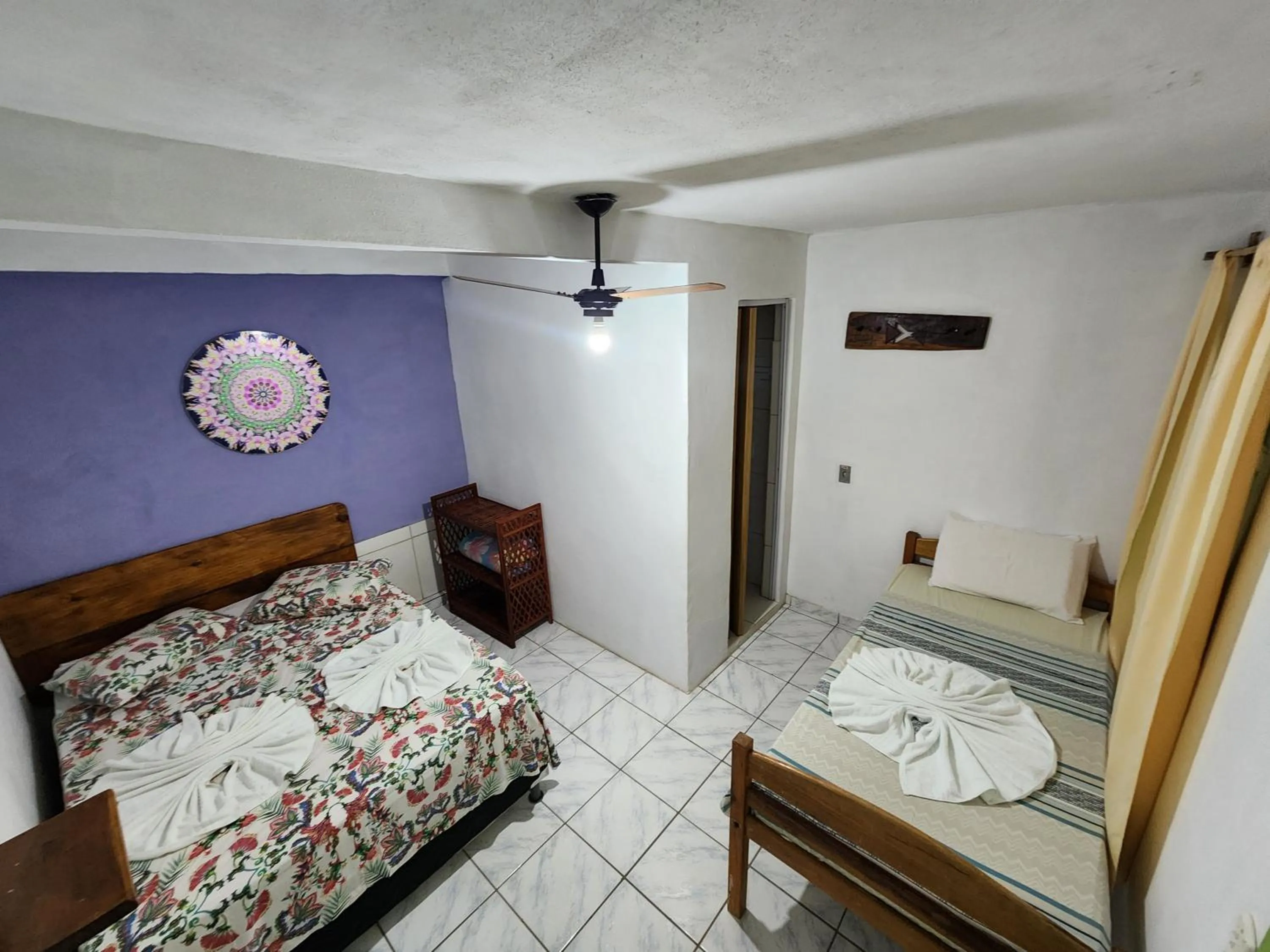 Bed in Pousada Velho Garimpo
