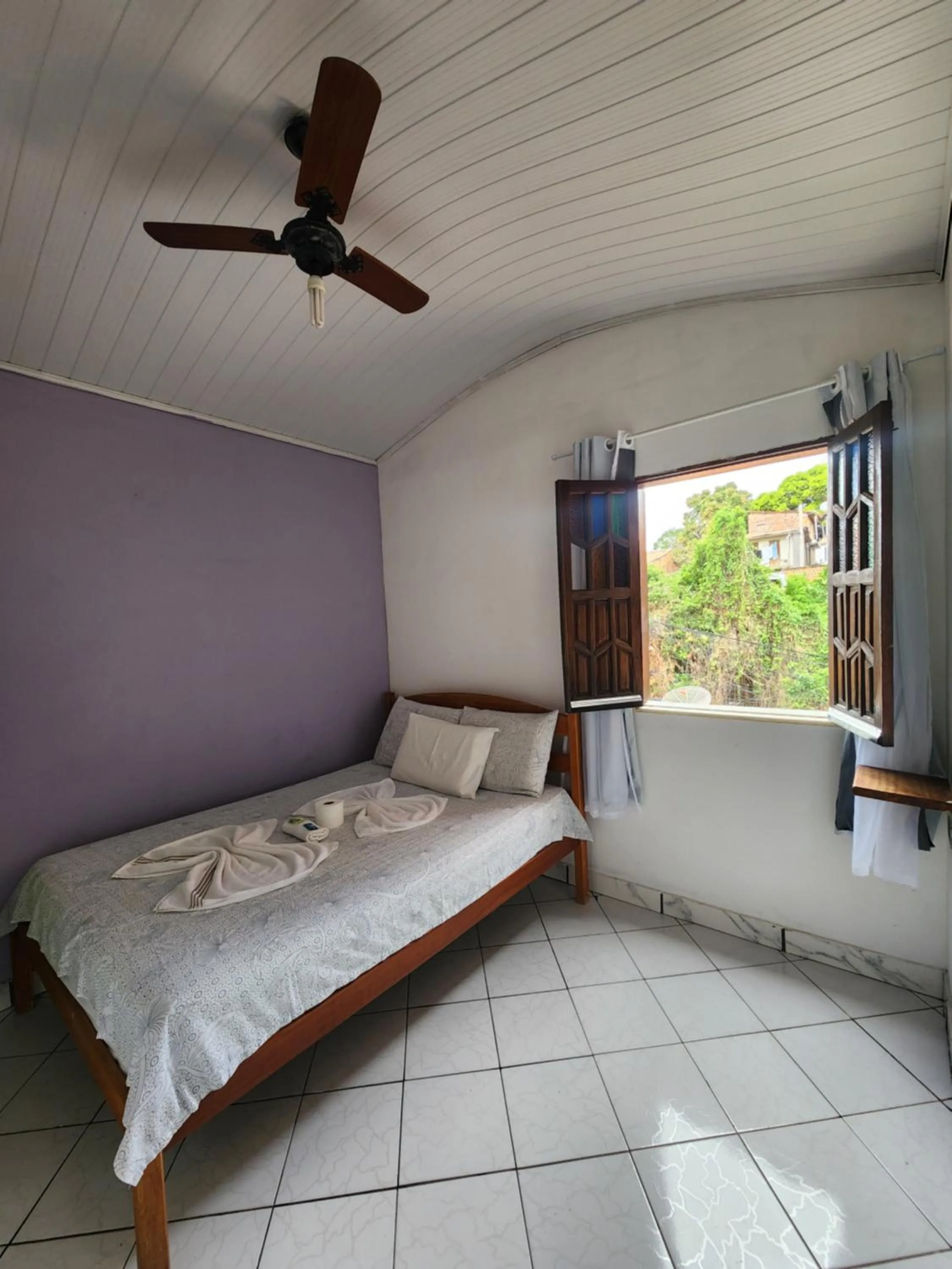 Bed in Pousada Velho Garimpo