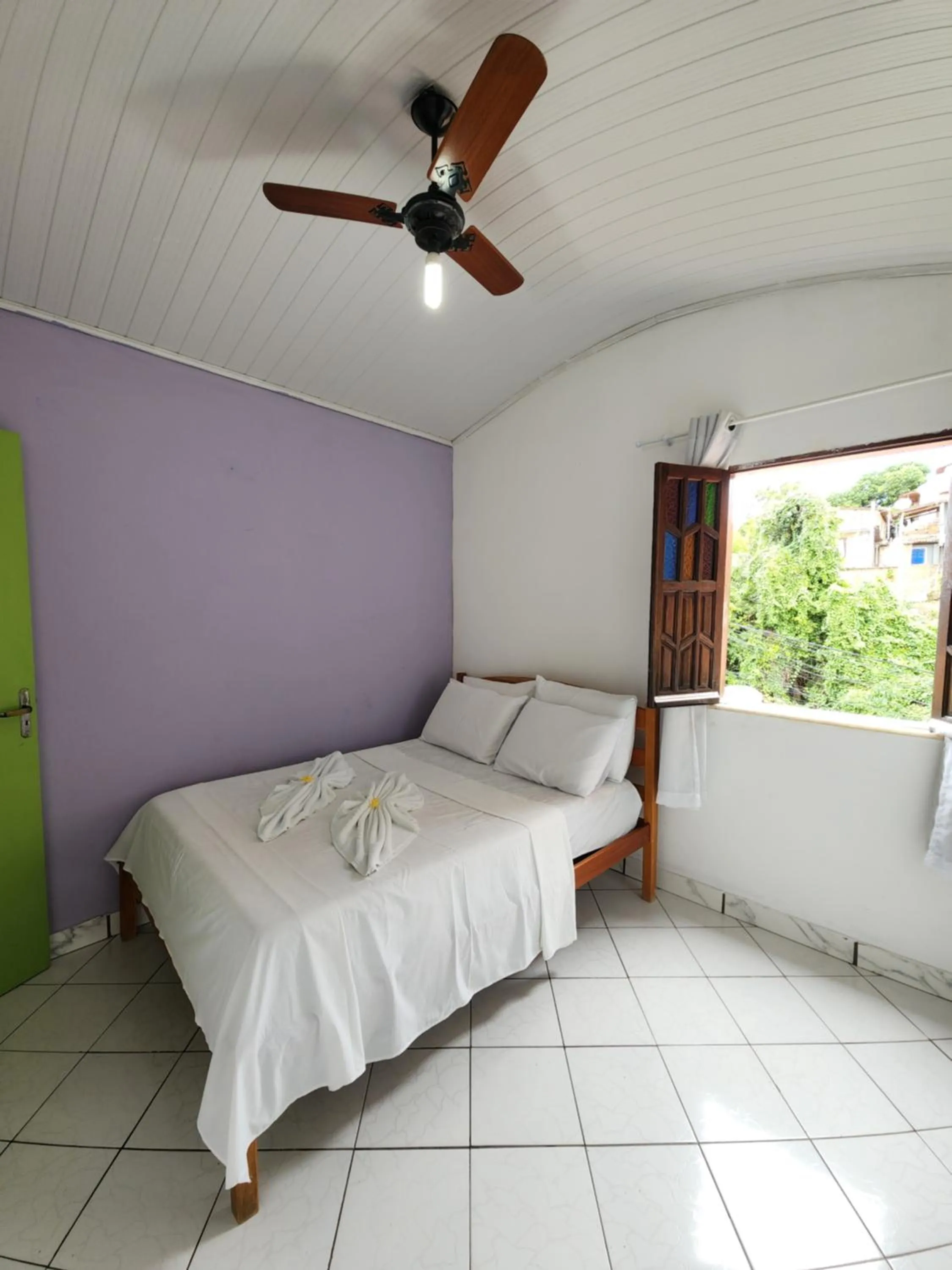 Bed in Pousada Velho Garimpo