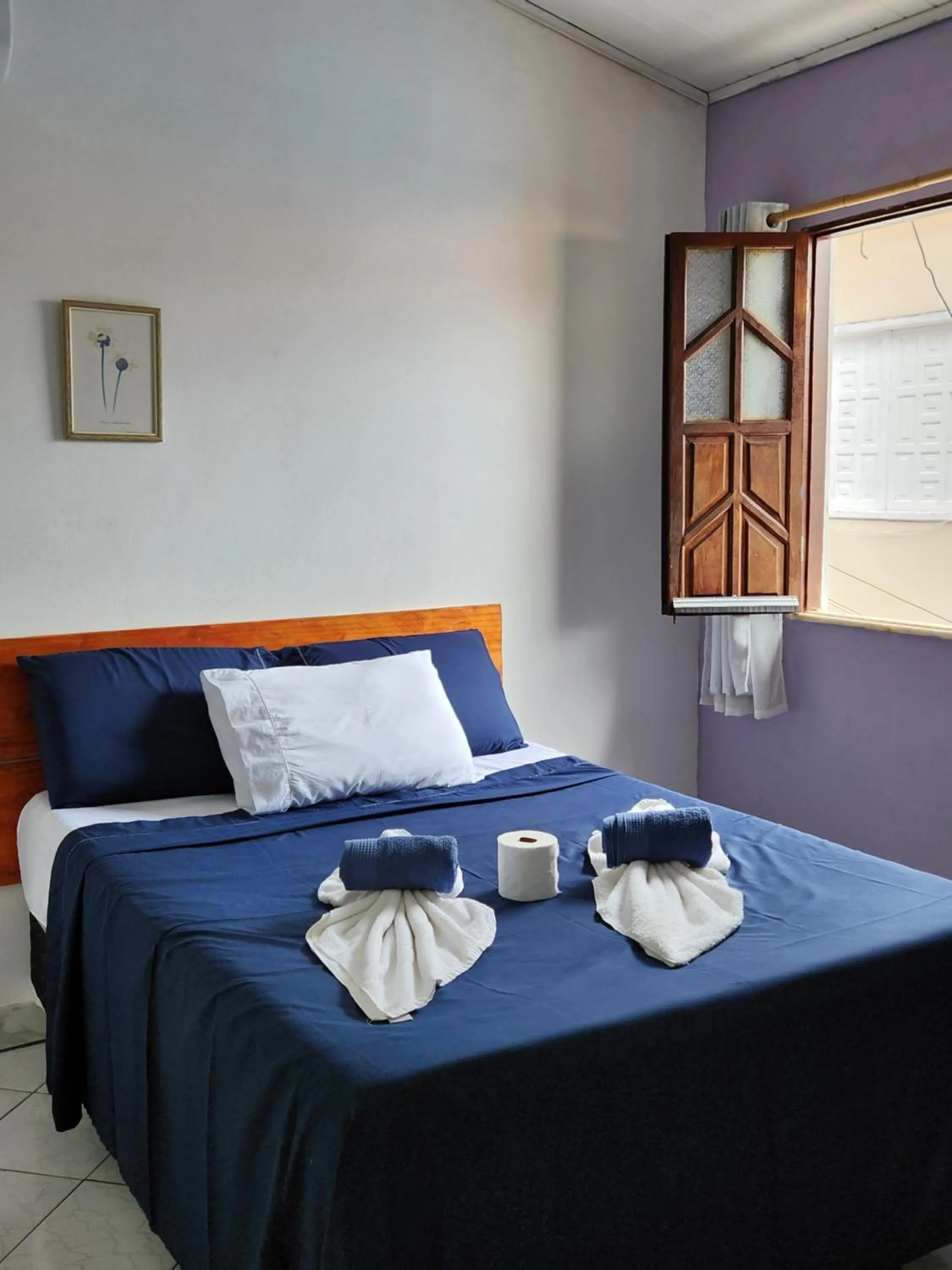 Bed in Pousada Velho Garimpo