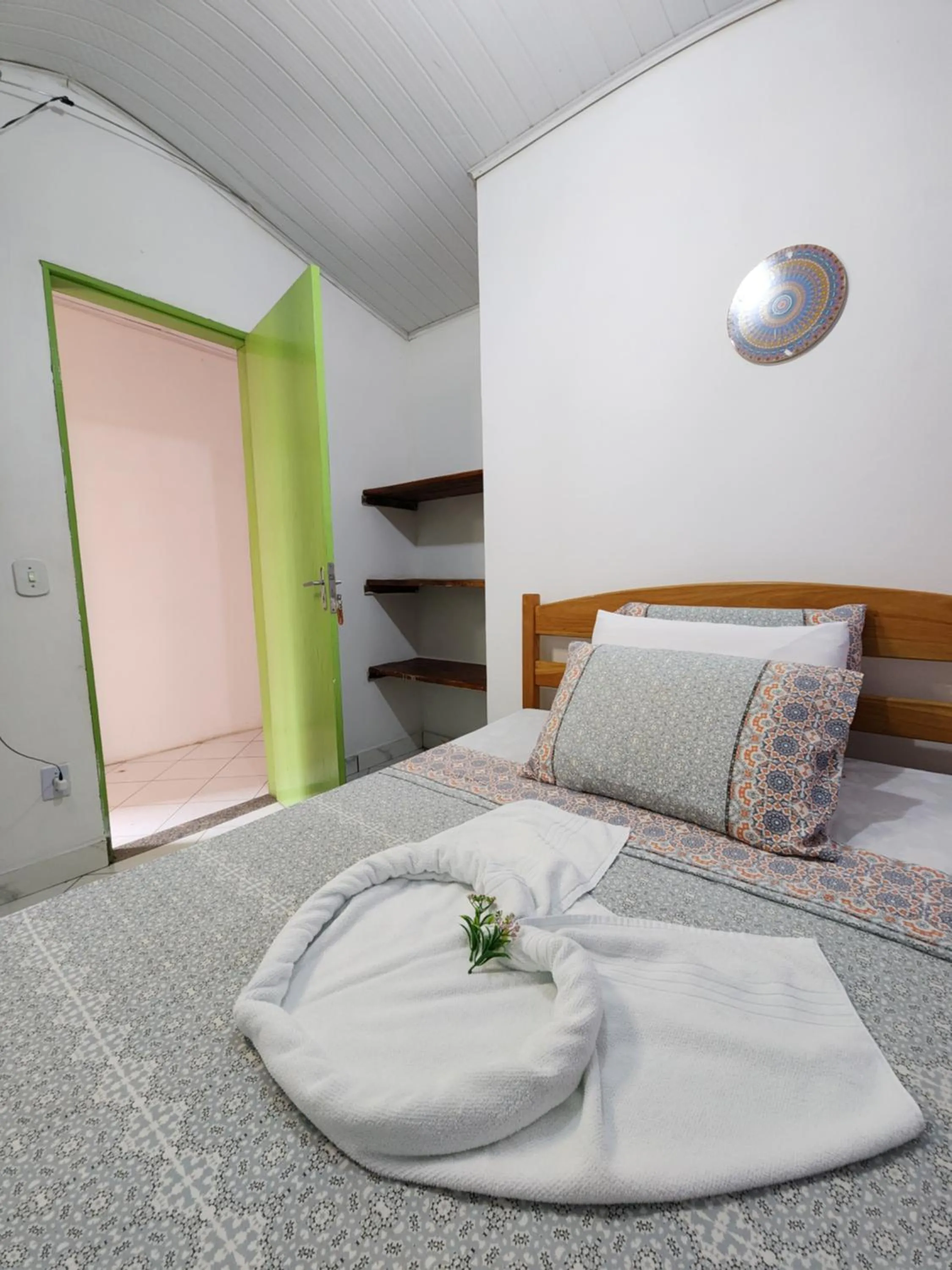 Bed in Pousada Velho Garimpo