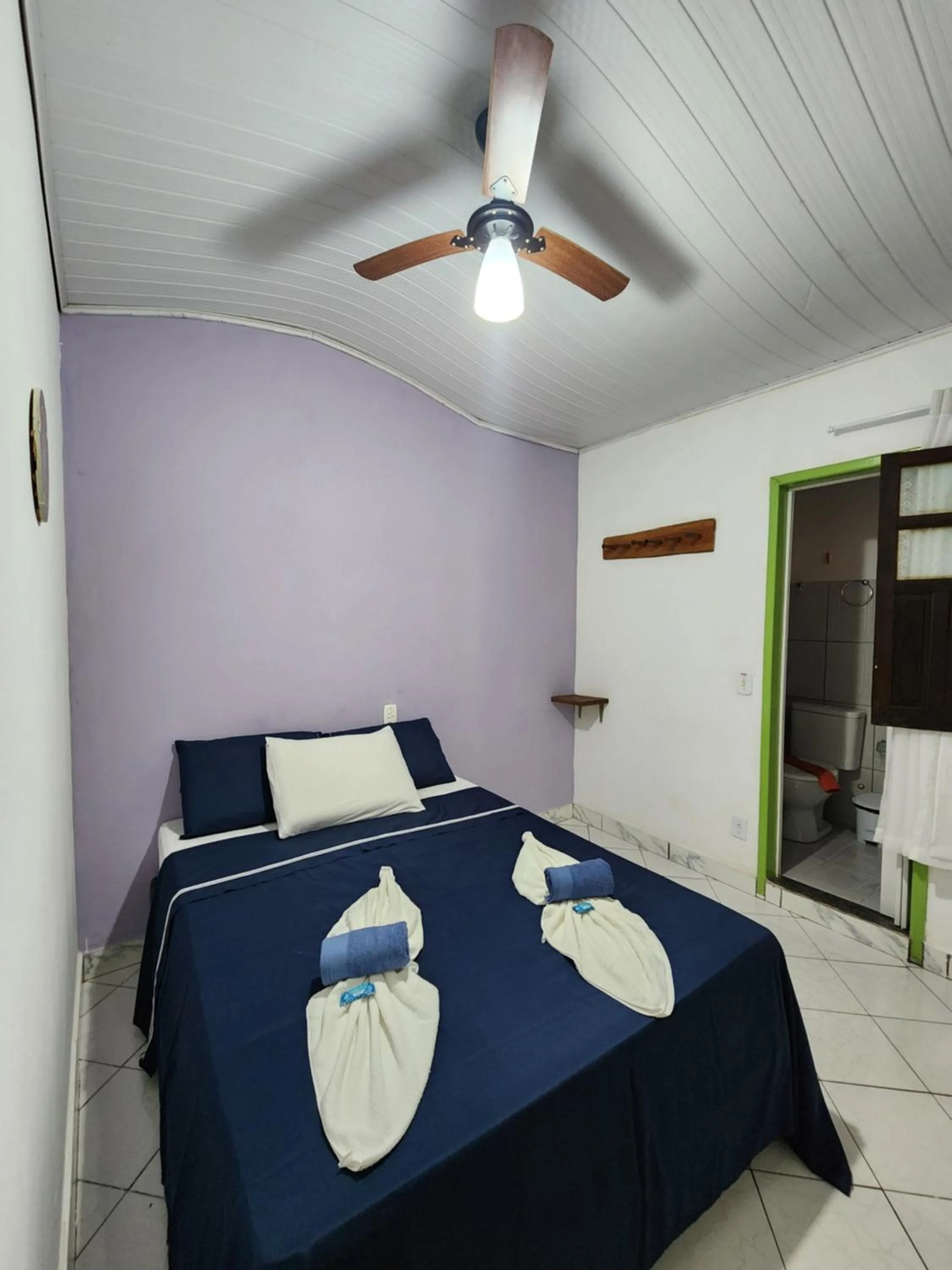 Bed in Pousada Velho Garimpo