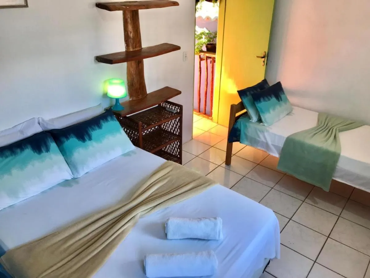 Bed in Pousada Velho Garimpo