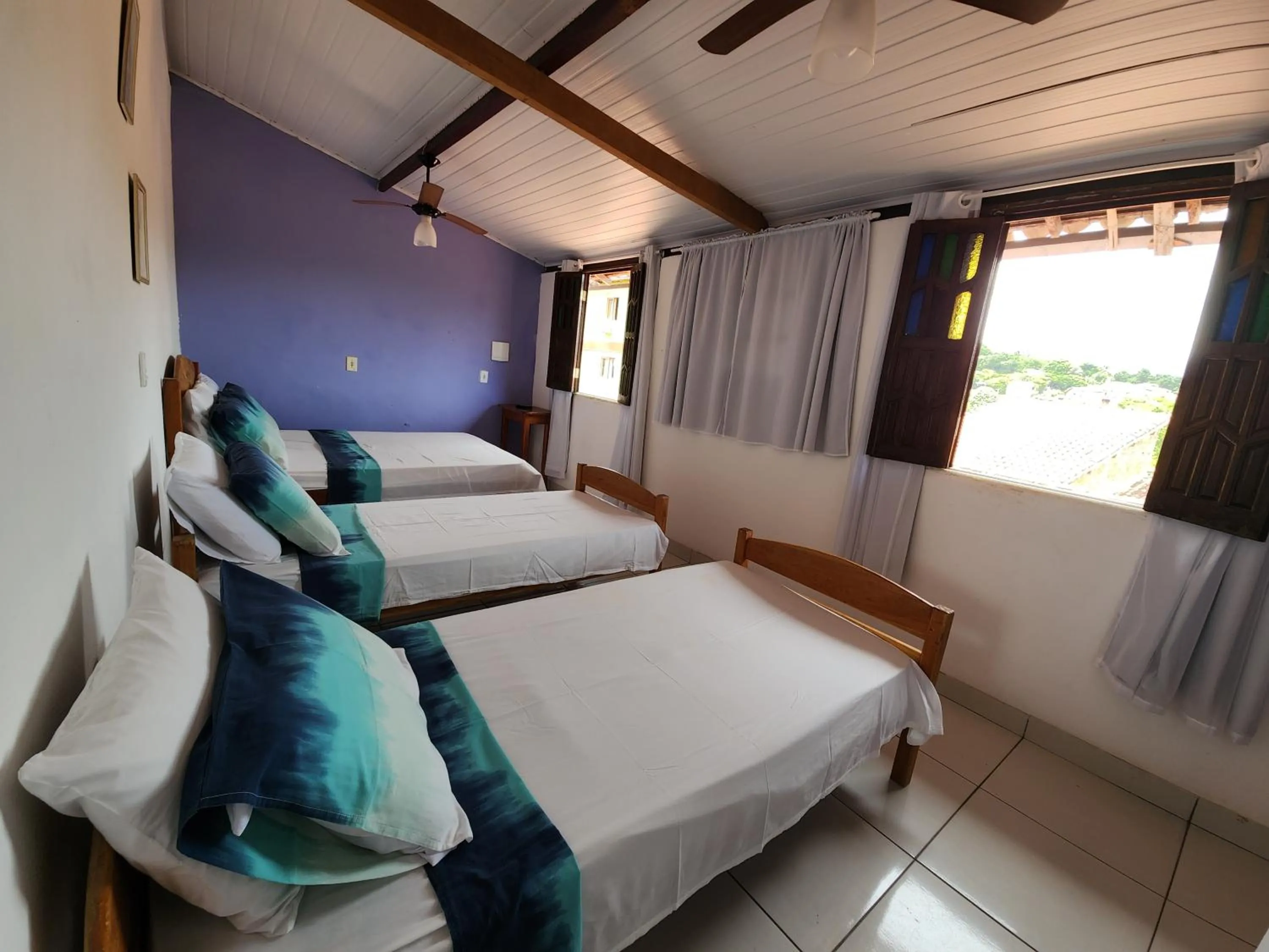 Bed in Pousada Velho Garimpo