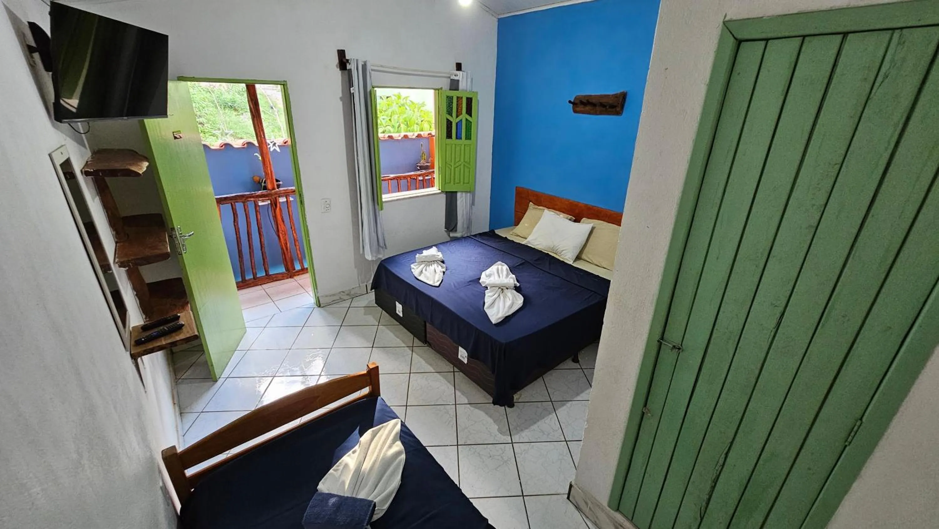 Bed in Pousada Velho Garimpo