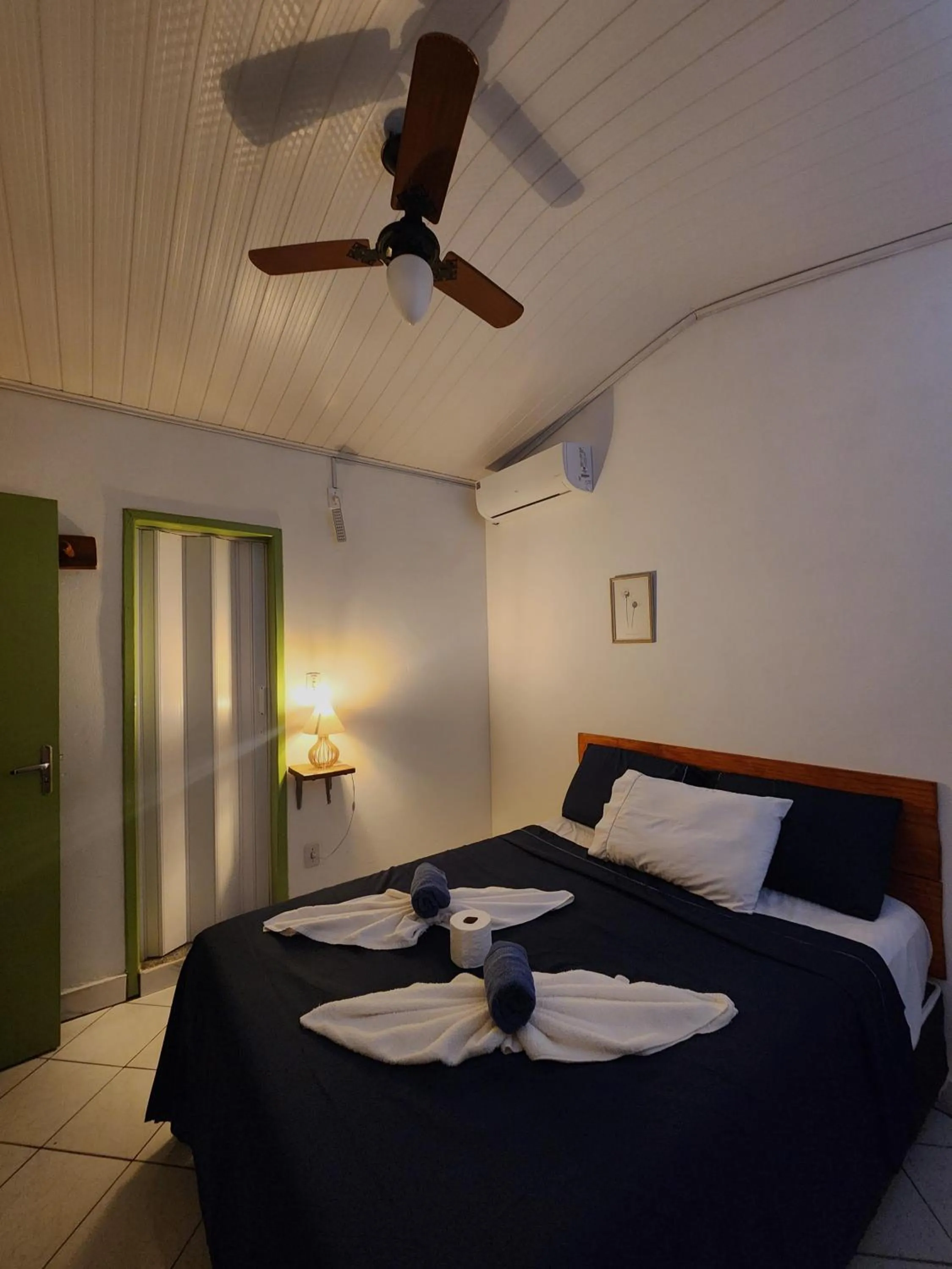 Bed in Pousada Velho Garimpo