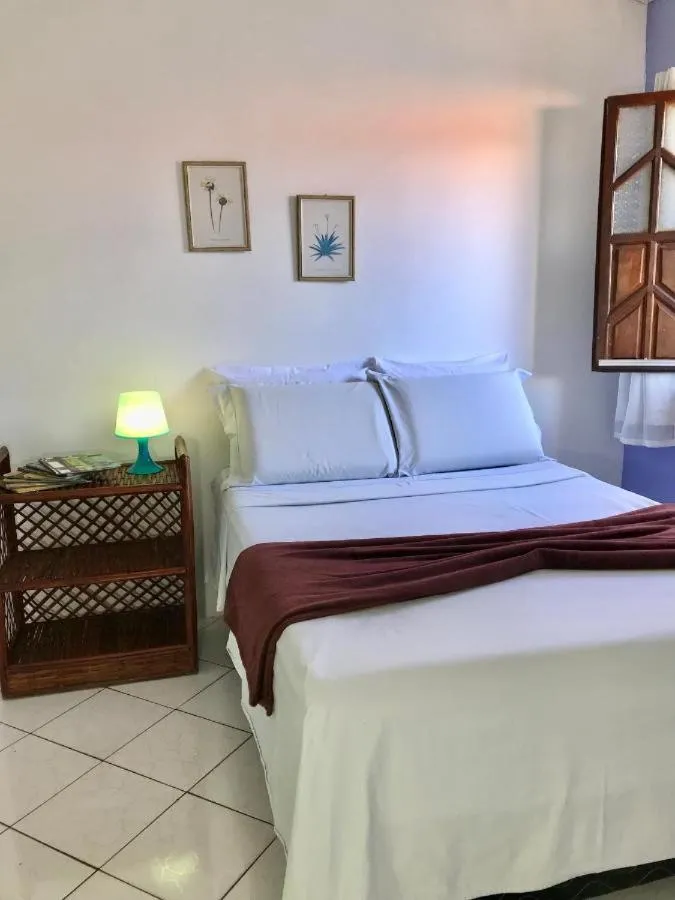 Bed in Pousada Velho Garimpo