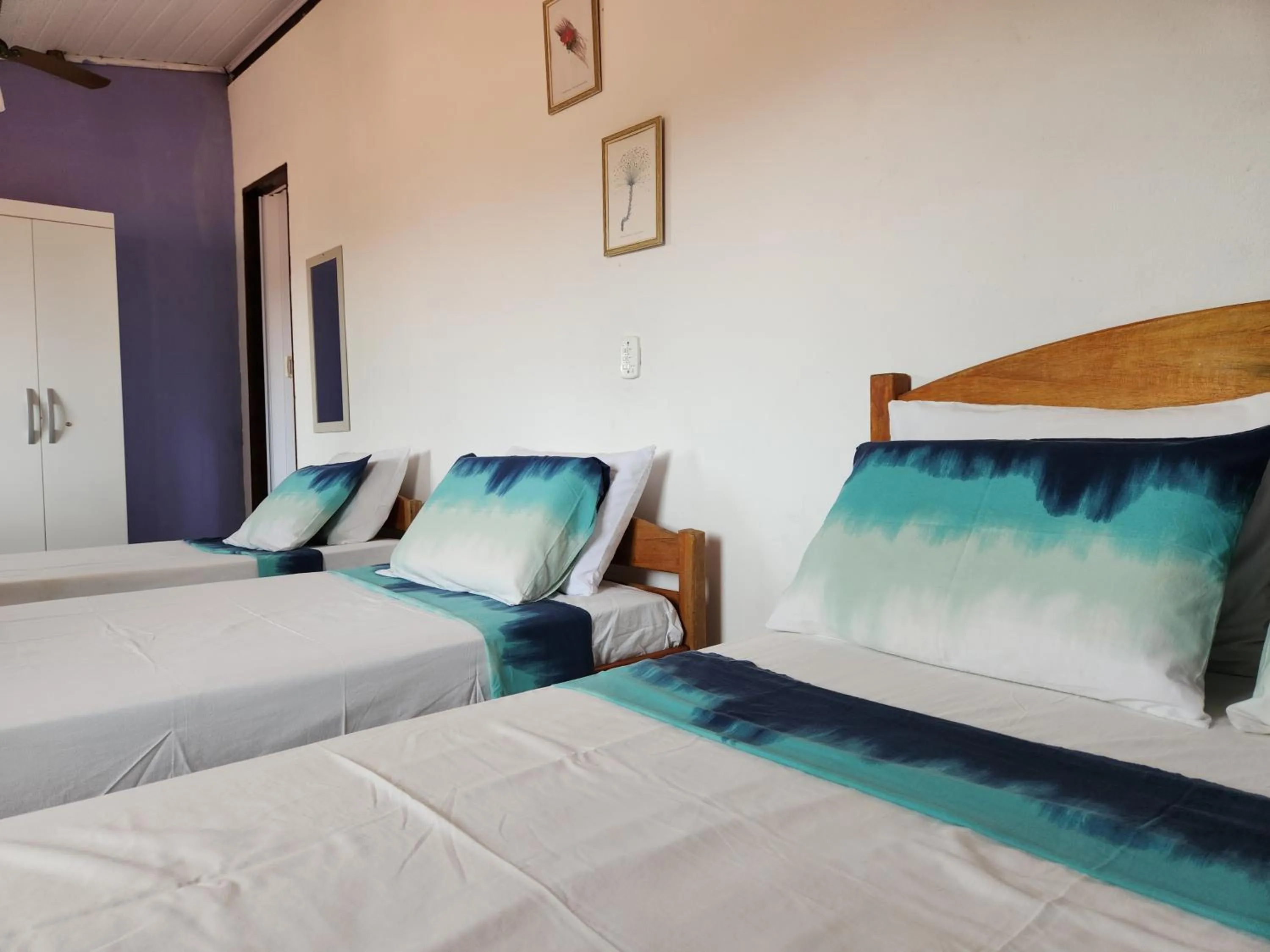 Bed in Pousada Velho Garimpo