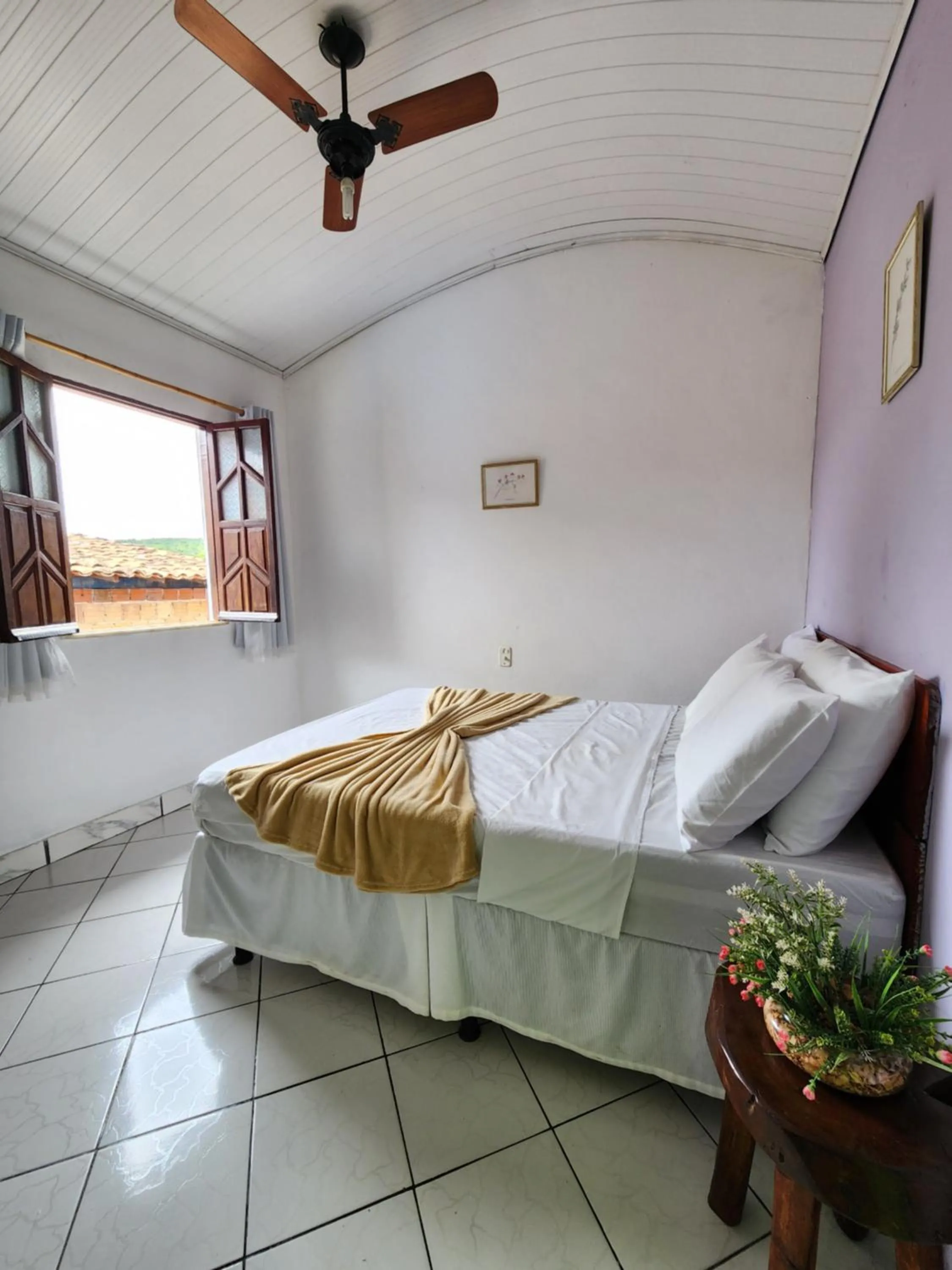 Bed in Pousada Velho Garimpo